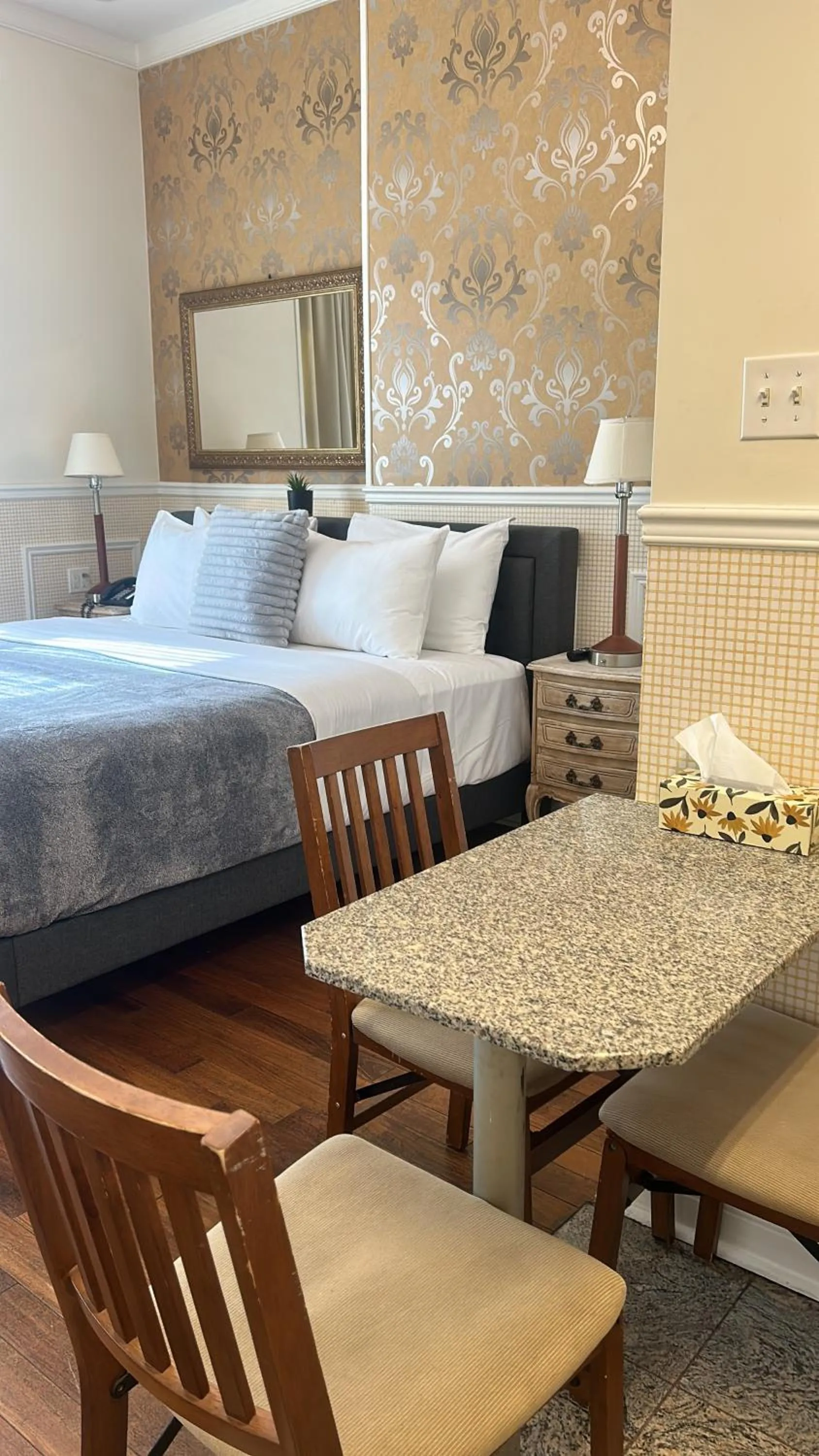 Bed in Parc Suites Hotel