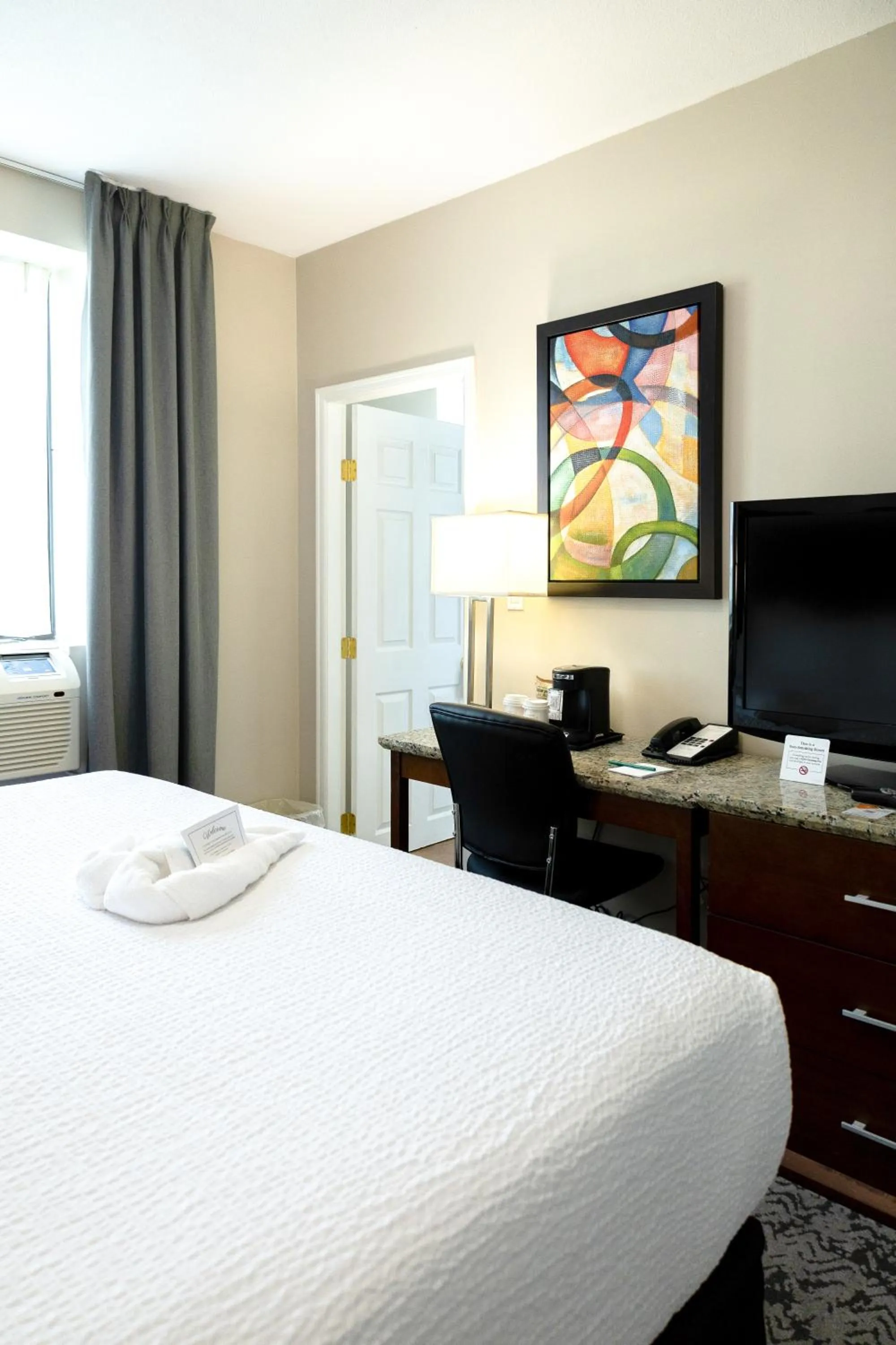 Bed in Quality Inn & Suites