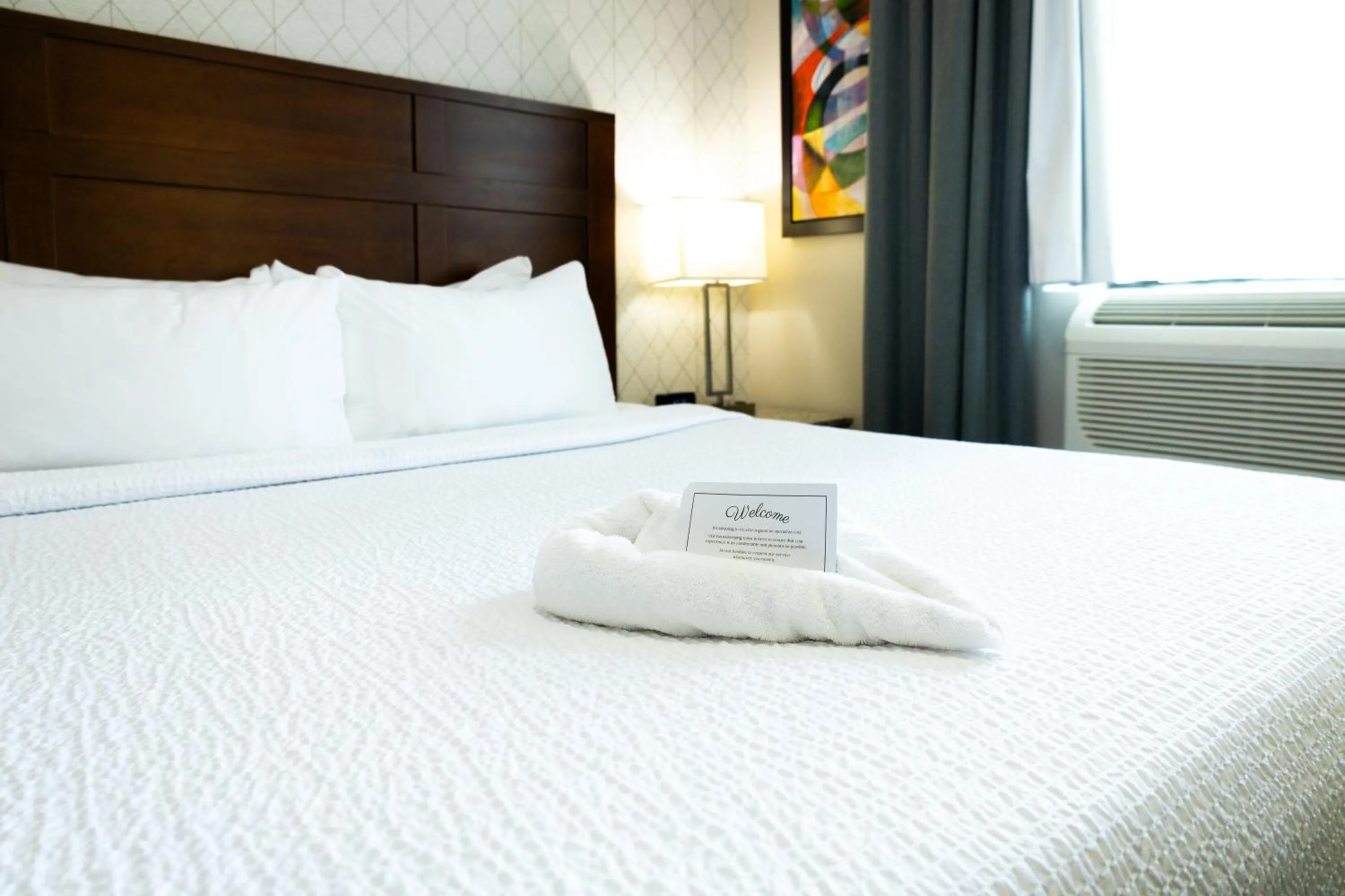 Bed in Quality Inn & Suites