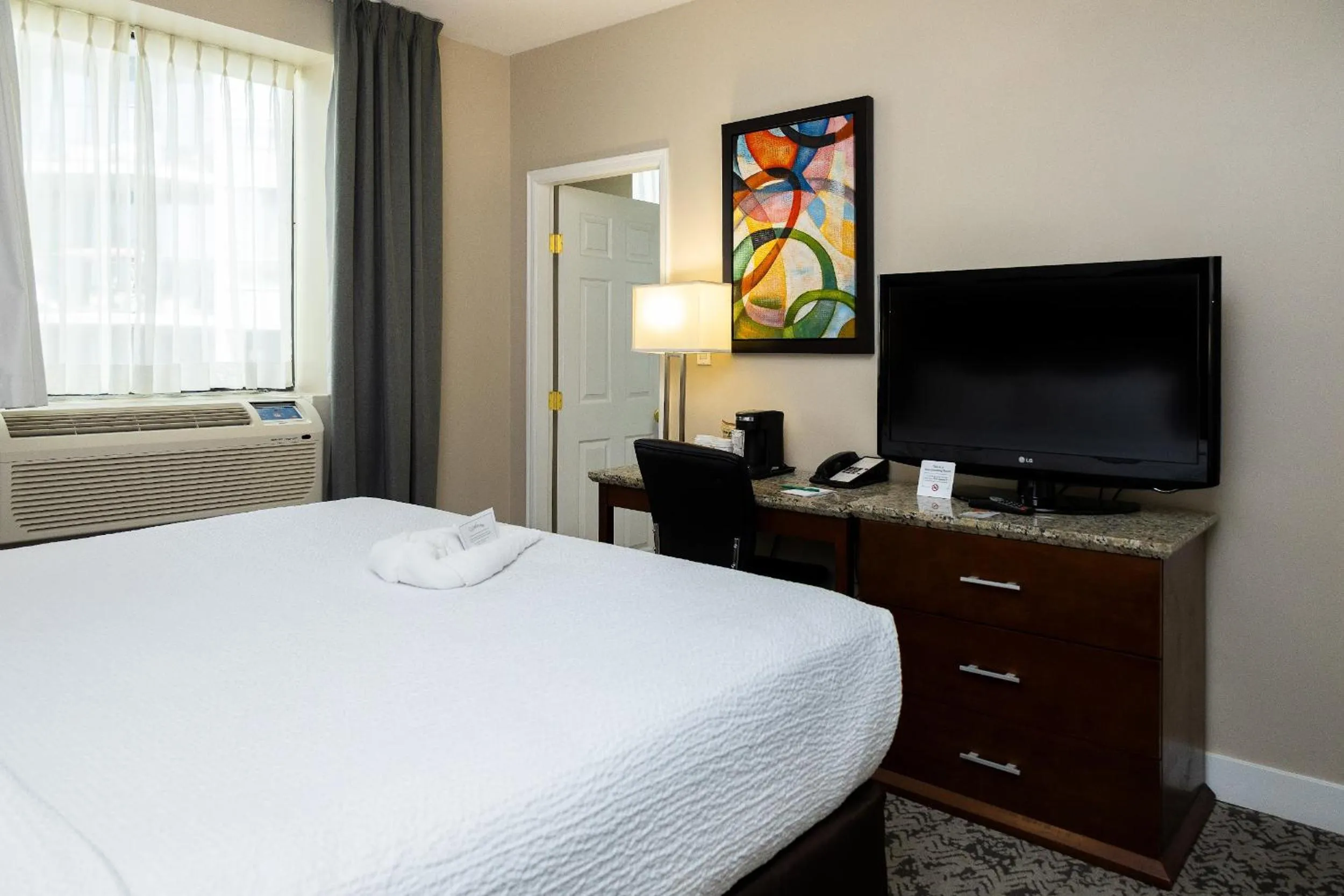 Bed in Quality Inn & Suites