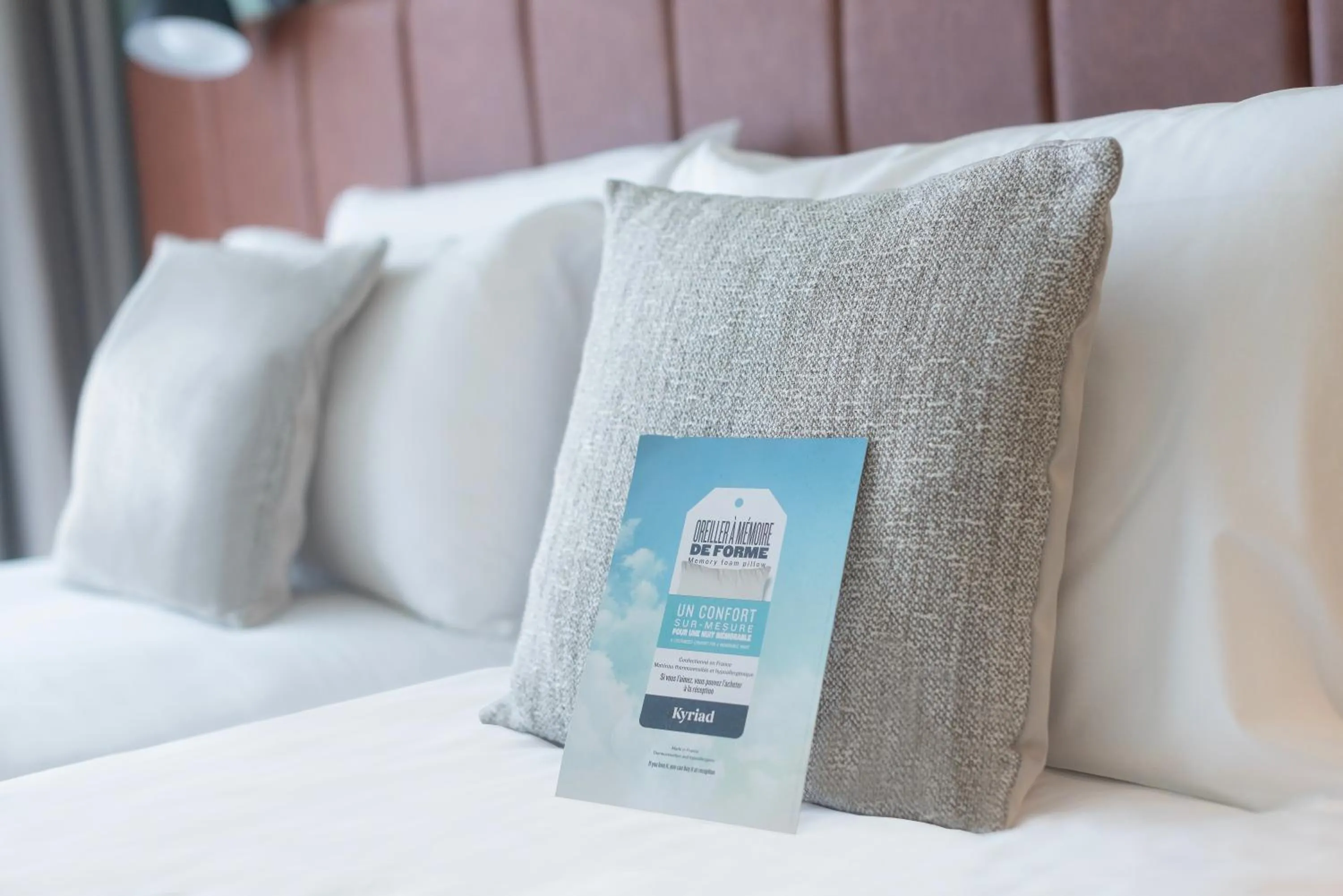 Decorative detail, Bed in KYRIAD LYON OUEST Limonest