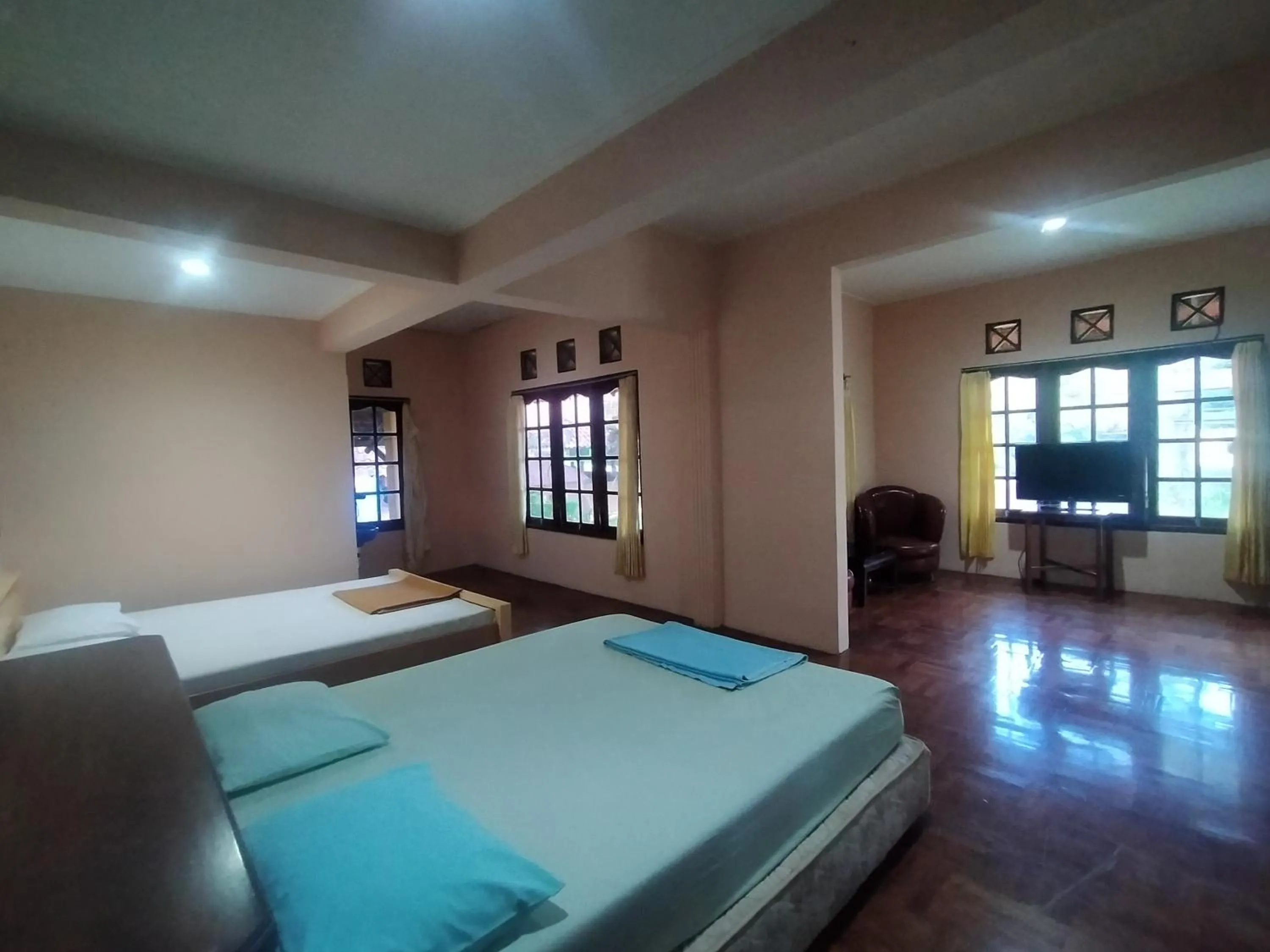 Bed in Villa Batu Tua Puncak Mitra RedDoorz