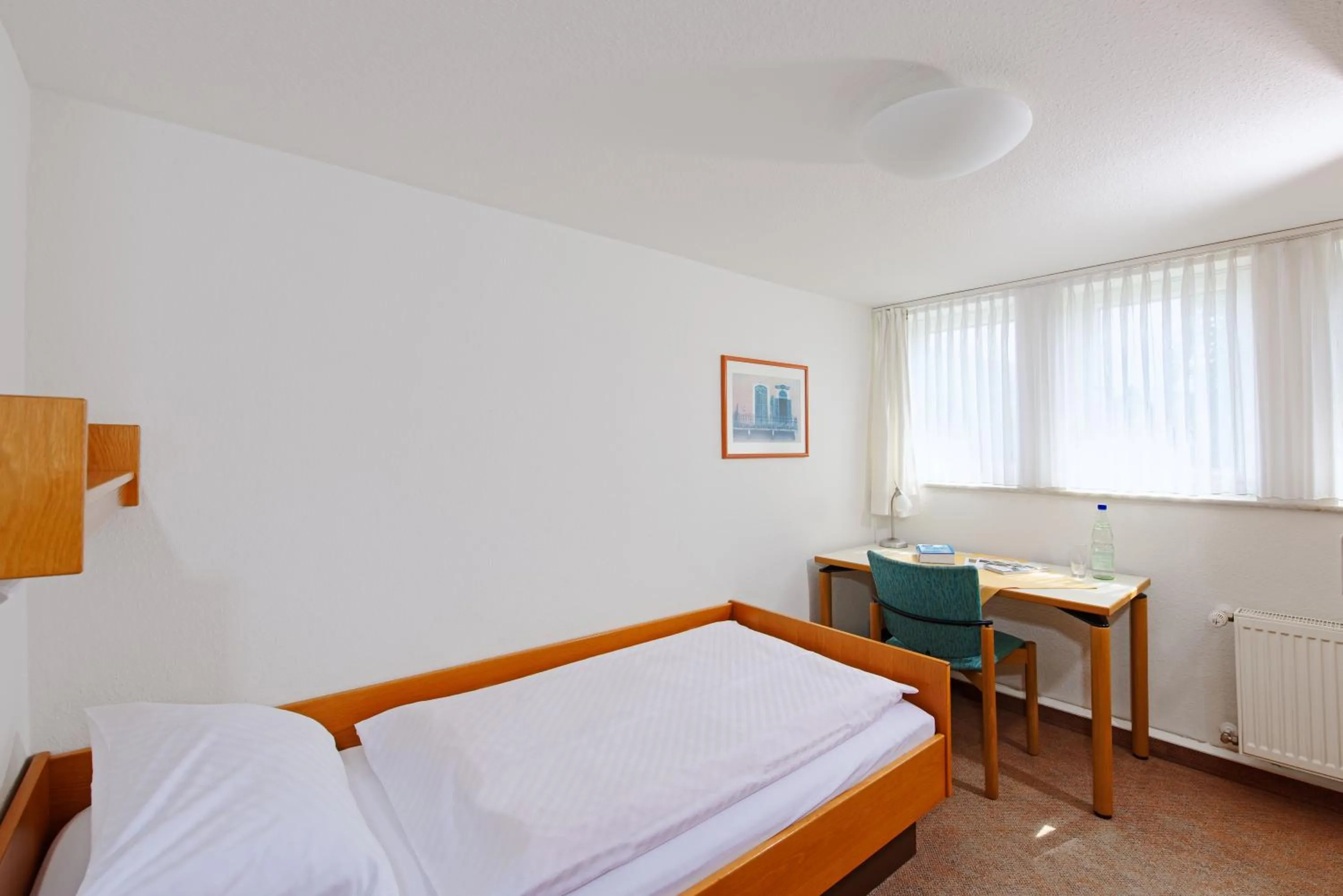 Photo of the whole room, Bed in St. Bonifatius