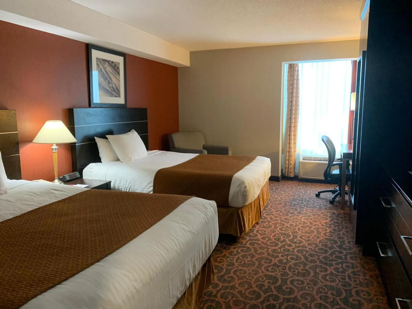 Bedroom, Bed in Ramada by Wyndham Niagara Falls/Fallsview