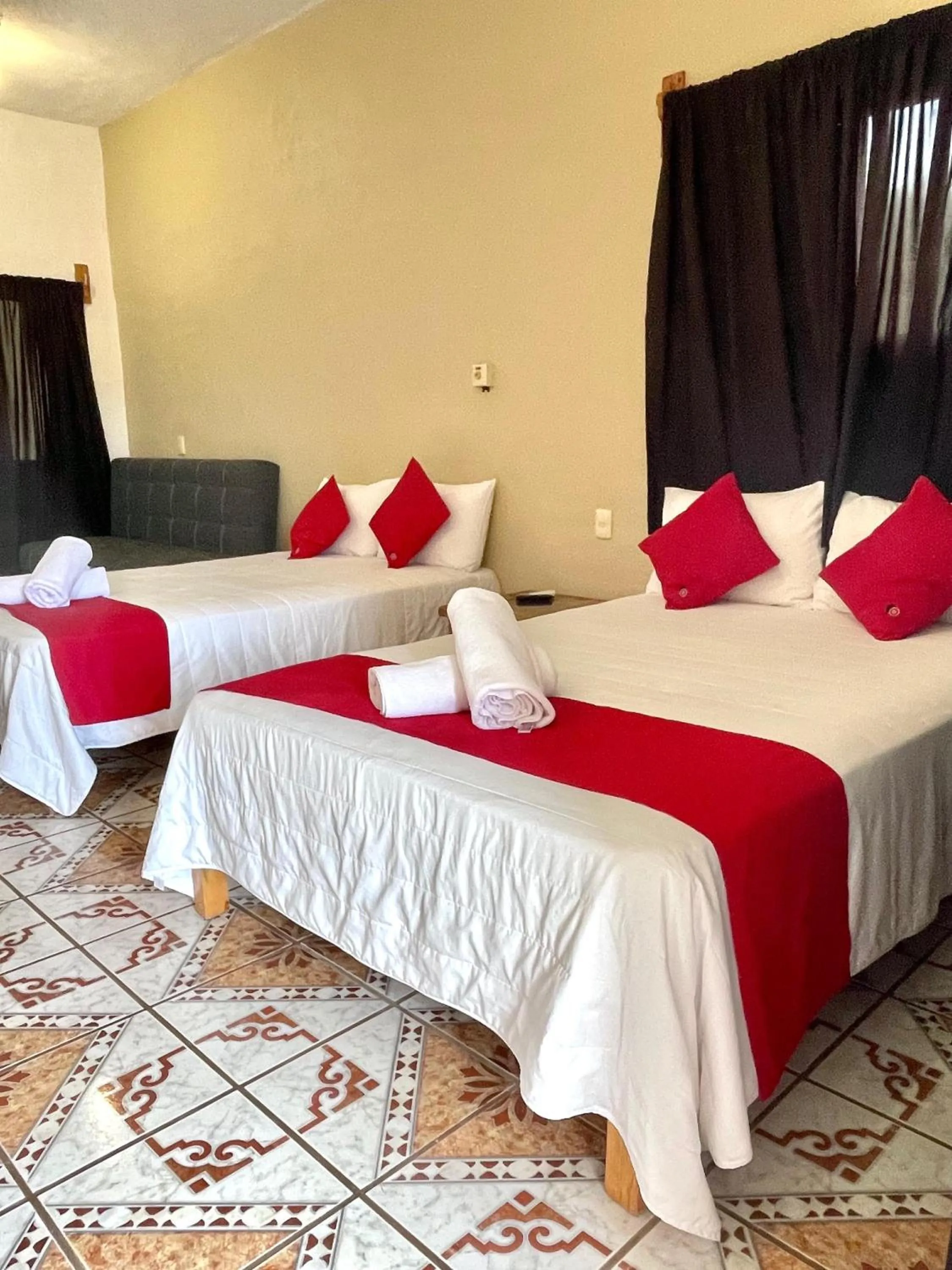 Bed in Hotel y Bungalows Bugambilias