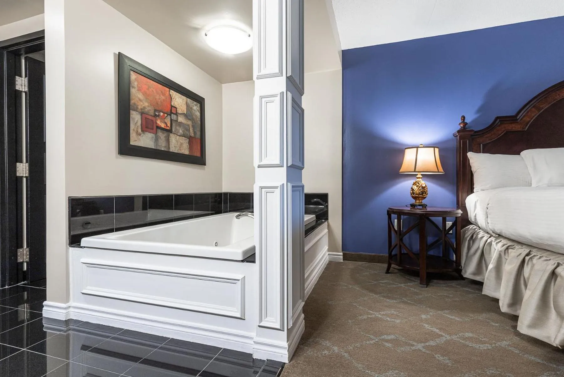 Bed in Old Stone Inn Boutique Hotel