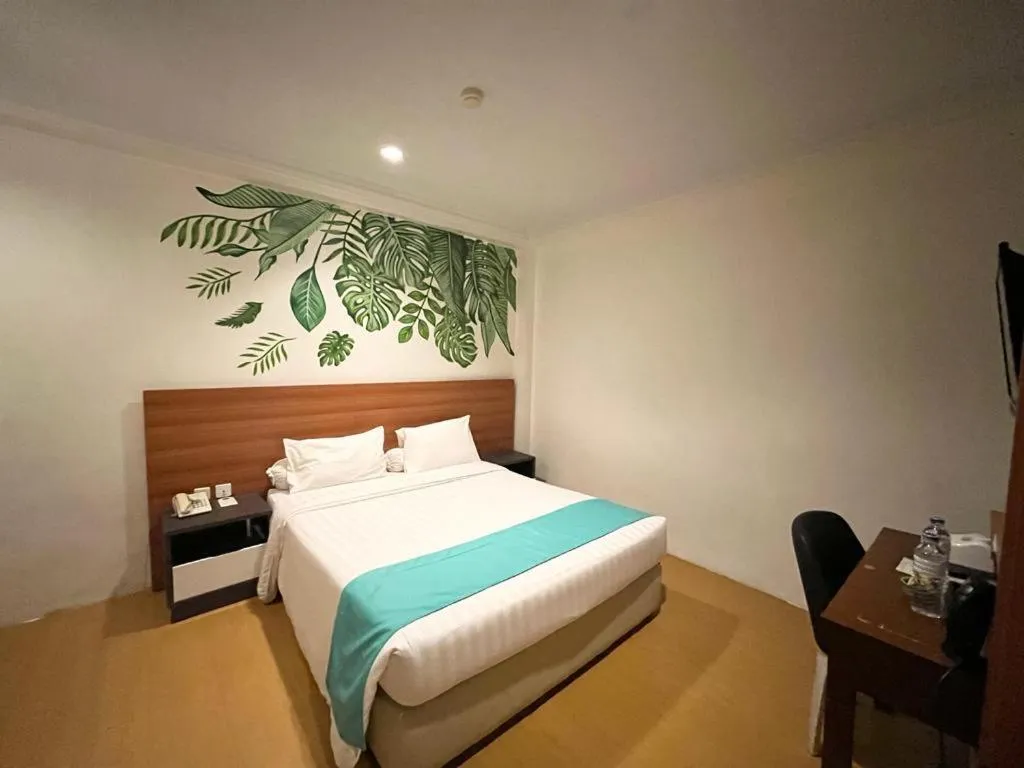 Bed in Front One Green Boutique Hotel Abepura