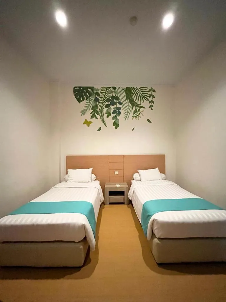 Bed in Front One Green Boutique Hotel Abepura