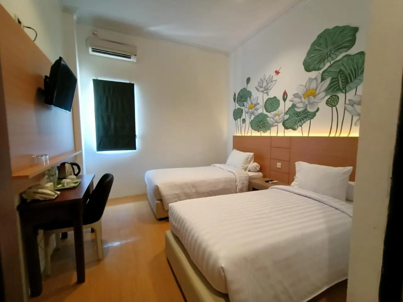 Bedroom, Bed in Front One Green Boutique Hotel Abepura