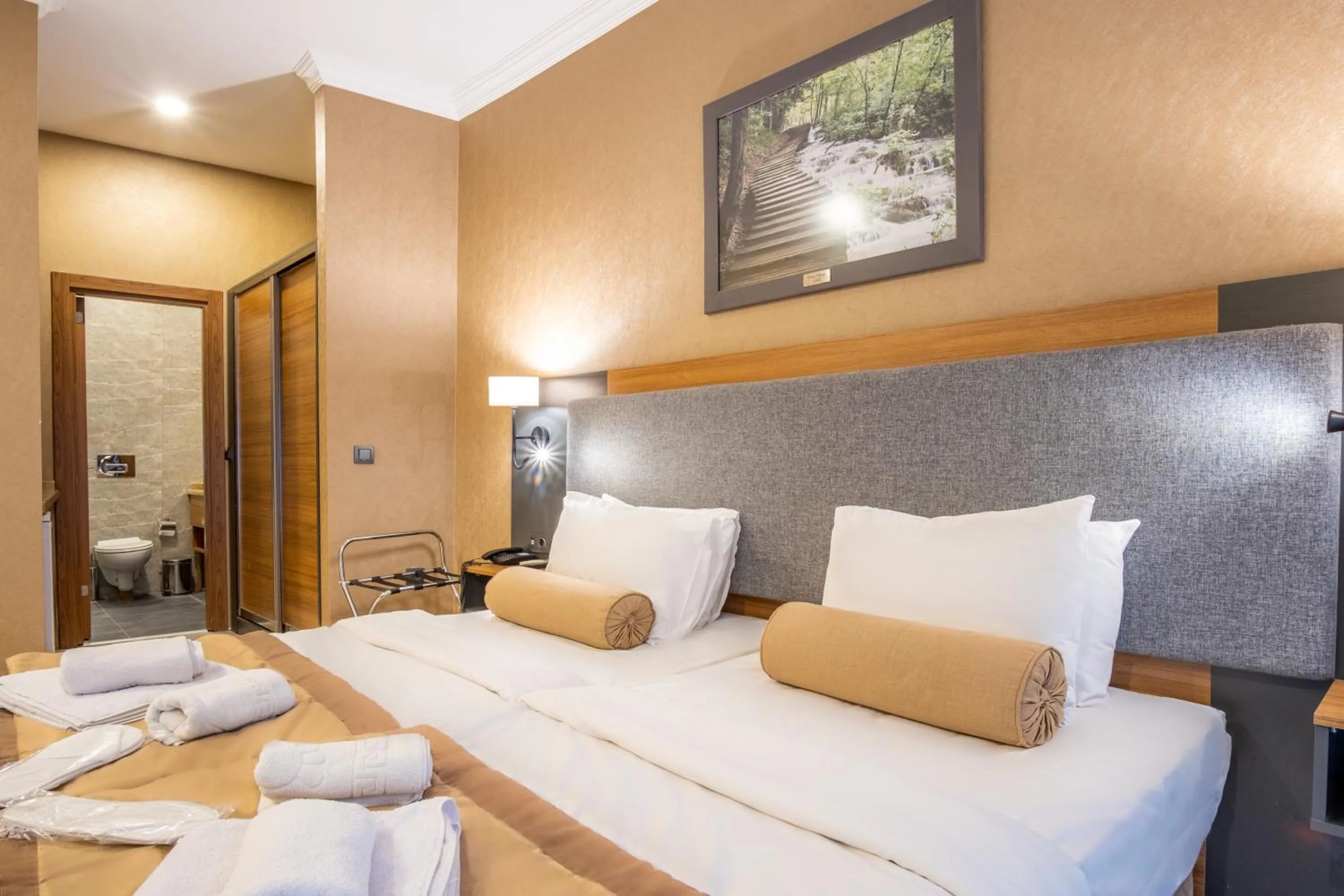 Bed in Orange Hotel & Spa