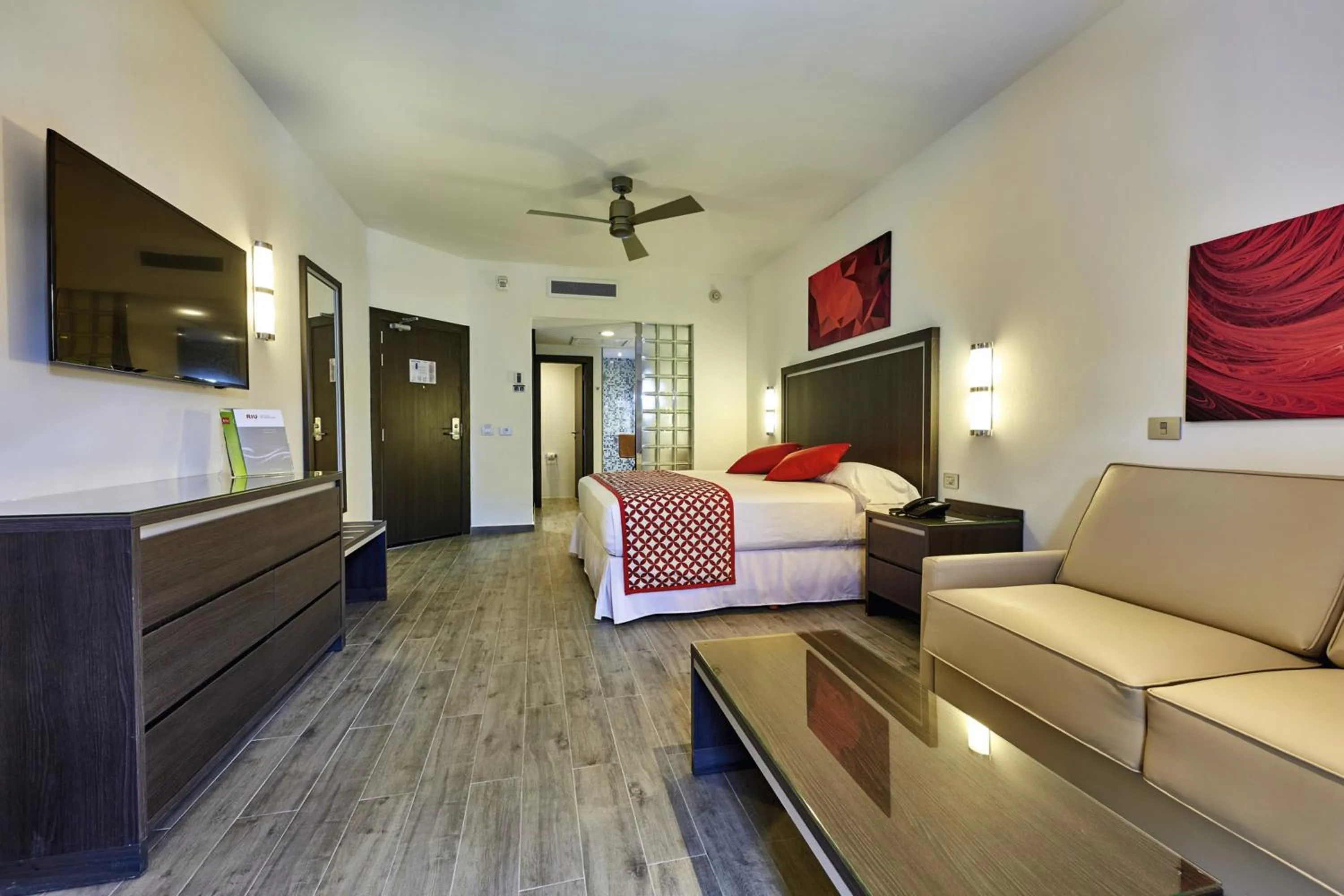 Living room, Bed in Riu Tequila - All Inclusive