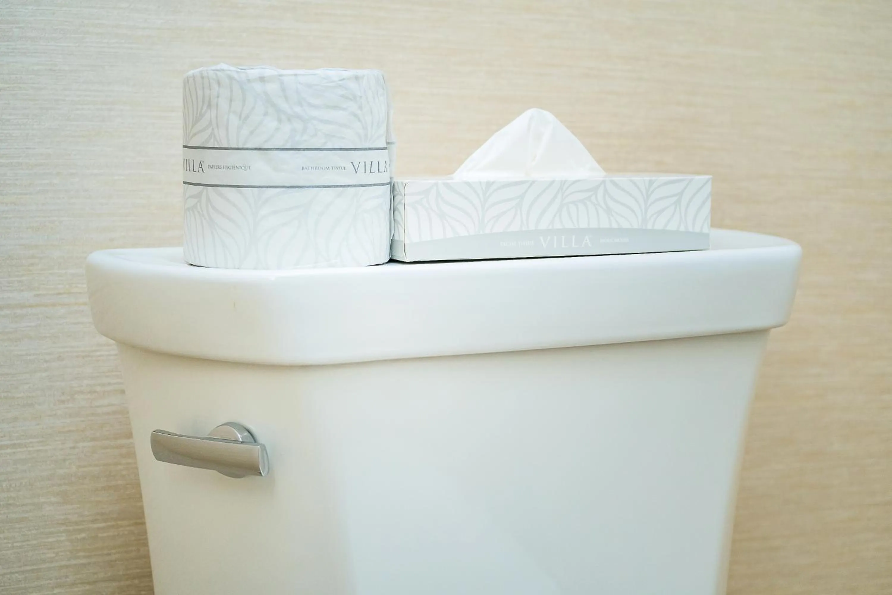 Toilet in Ramada By Wyndham Niagara Falls near the Falls