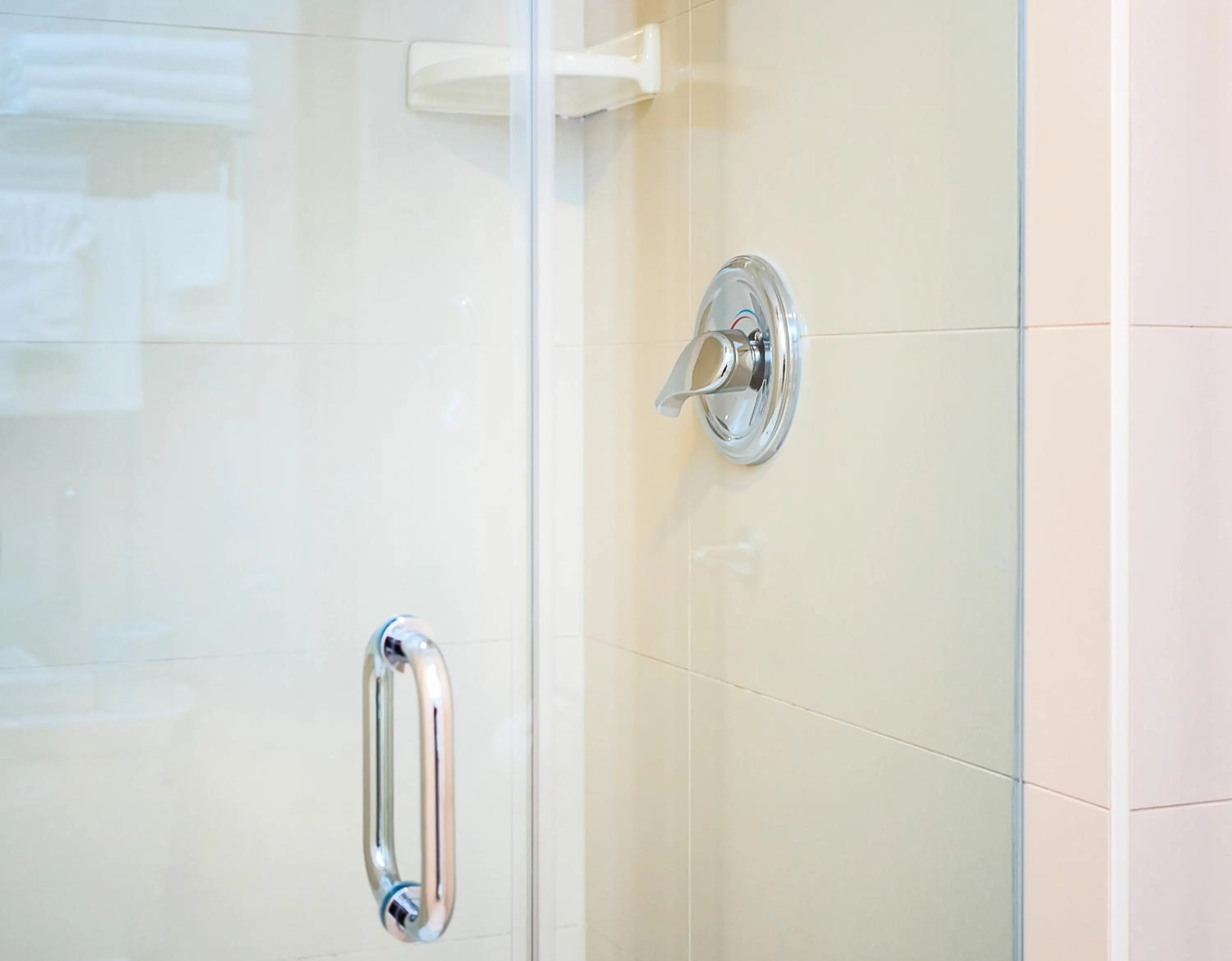 Shower in Ramada By Wyndham Niagara Falls near the Falls