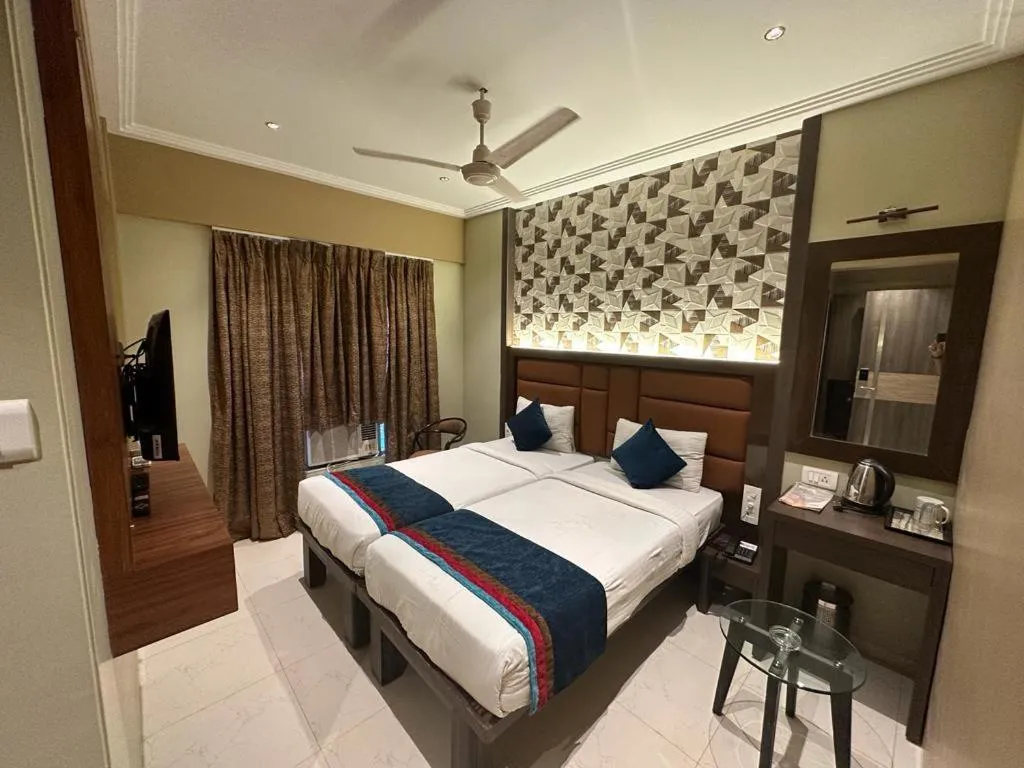 TV and multimedia, Bed in SriKrishna Paradise Hotel Thane Navi Mumbai