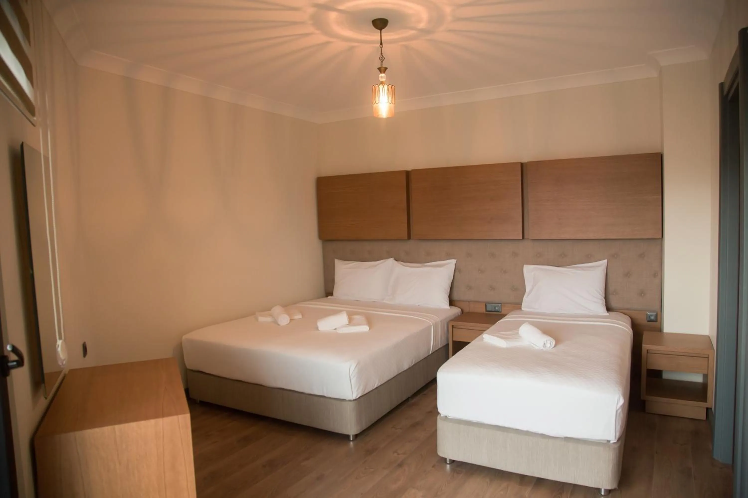 Bed in Ceneviz Suit Hotel