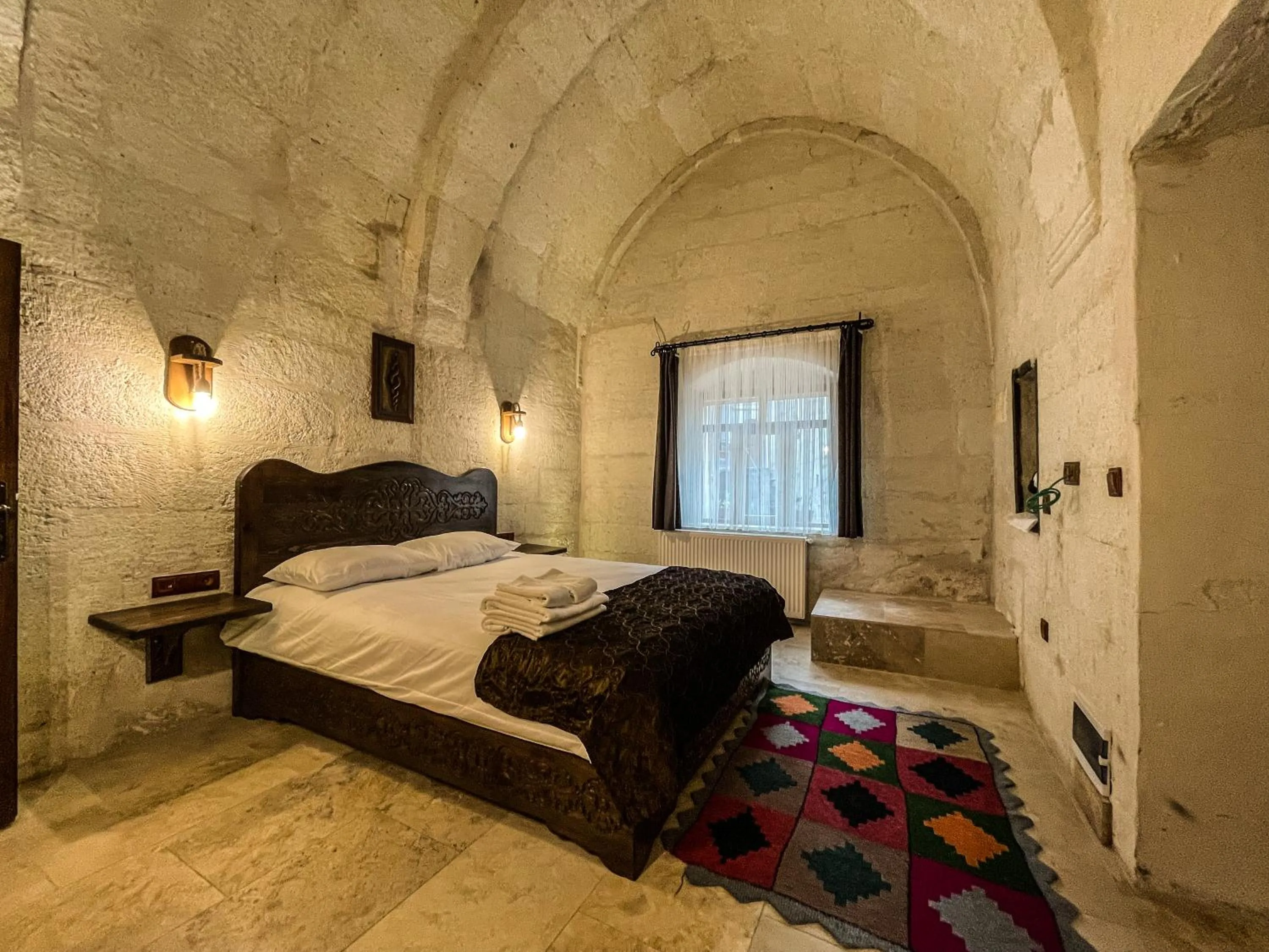 Bed in Takunya Cave Hotel