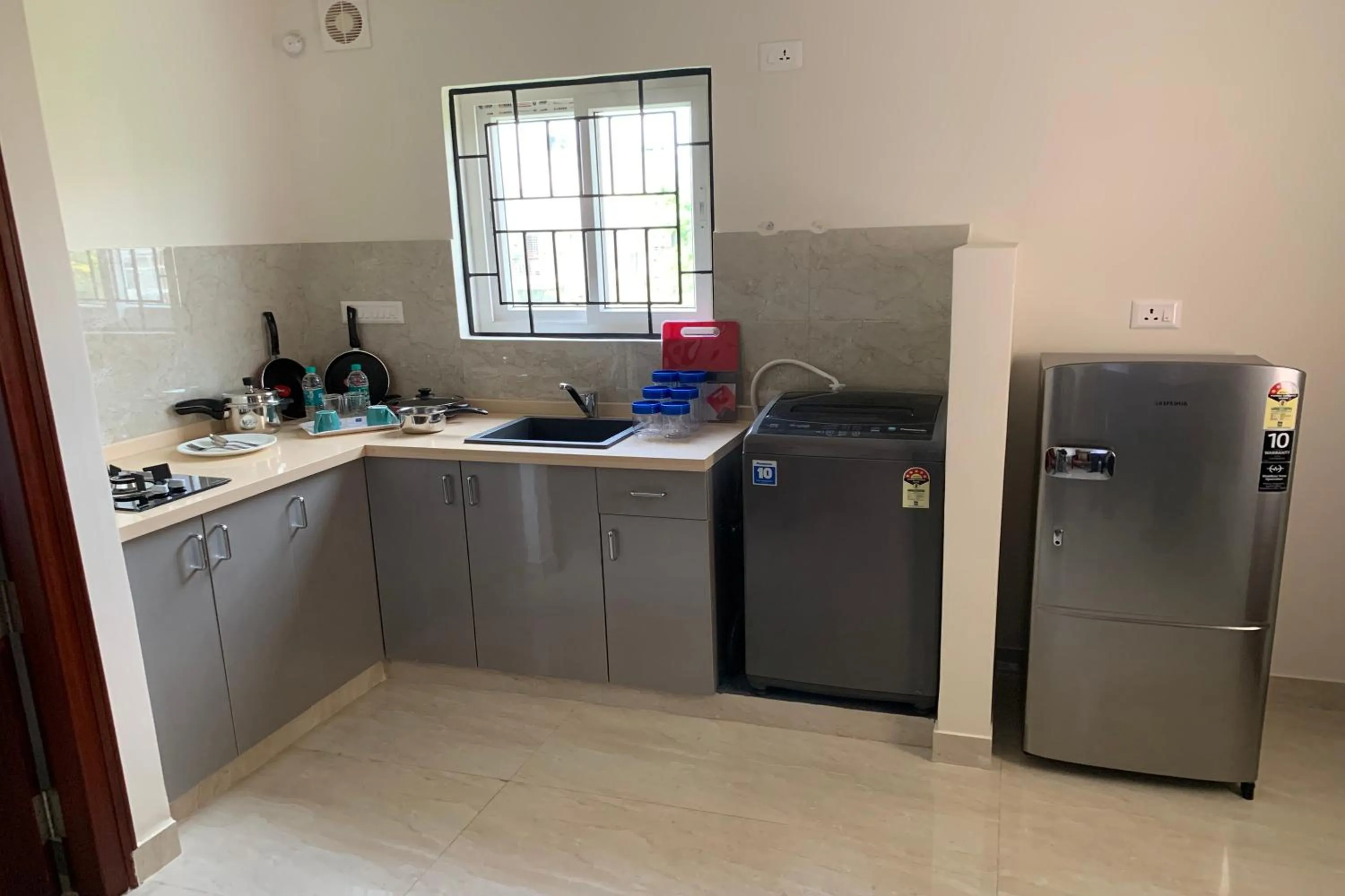 Kitchen or kitchenette in Vennela Hotel Apartments
