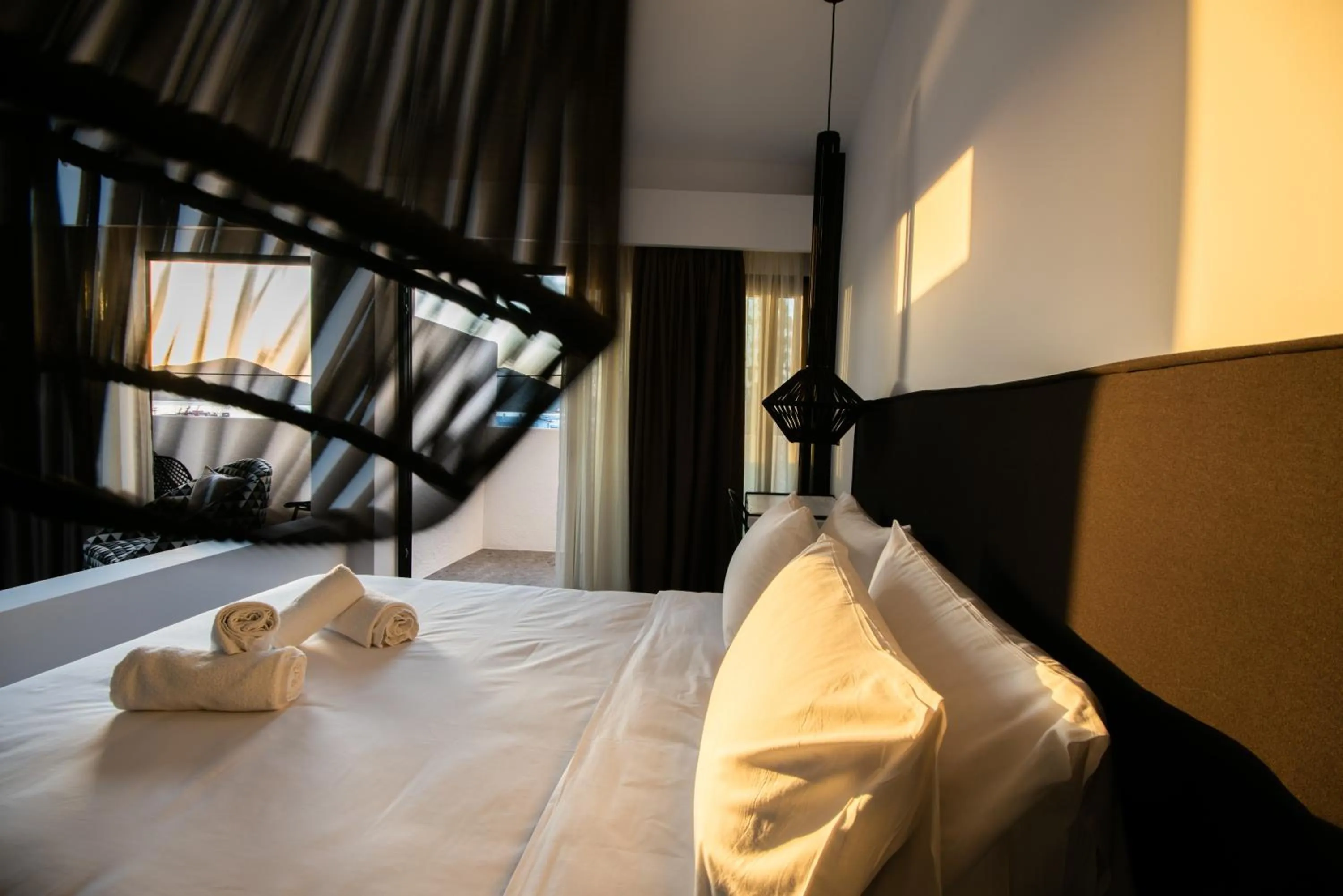 Bed in Kalypso Suites Hotel - Adults Only