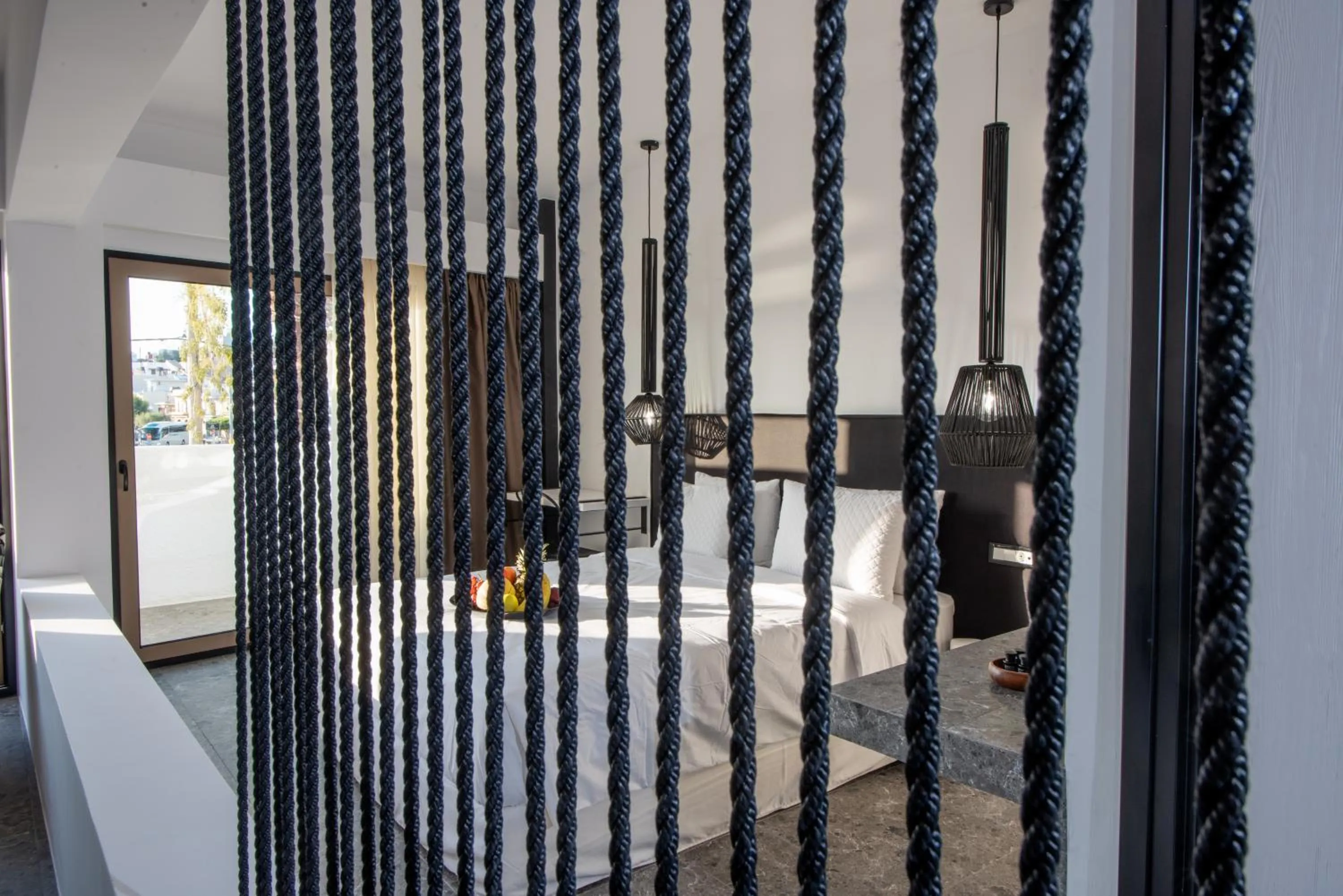 Bed in Kalypso Suites Hotel - Adults Only