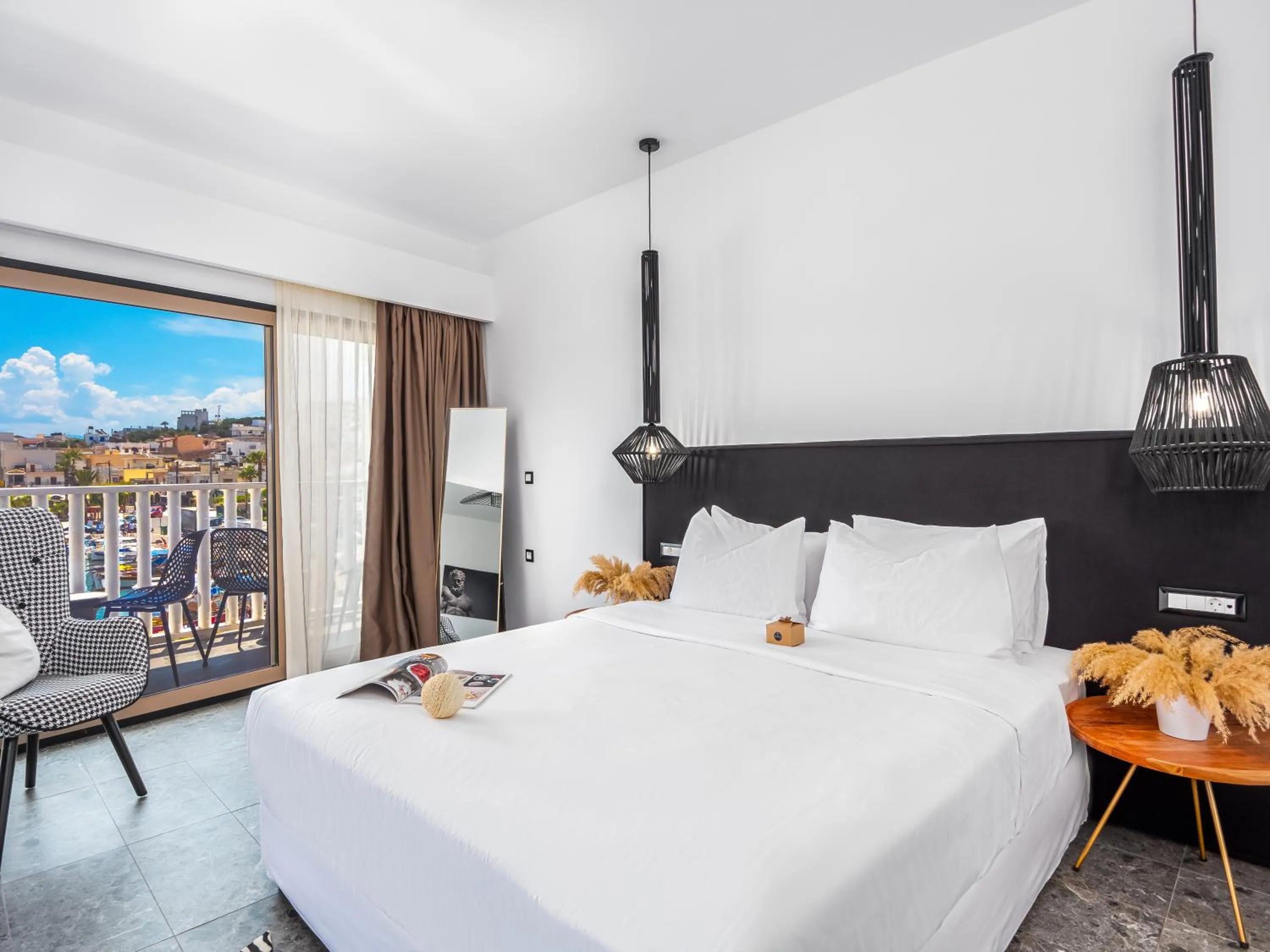 Bed in Kalypso Suites Hotel - Adults Only