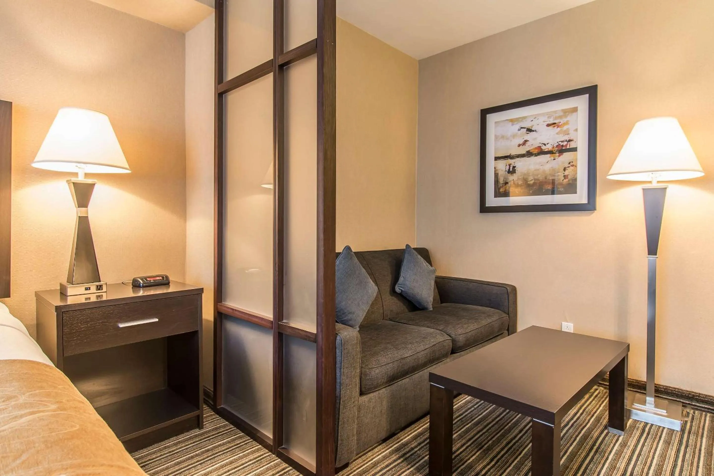 Bedroom in Comfort Suites Downtown