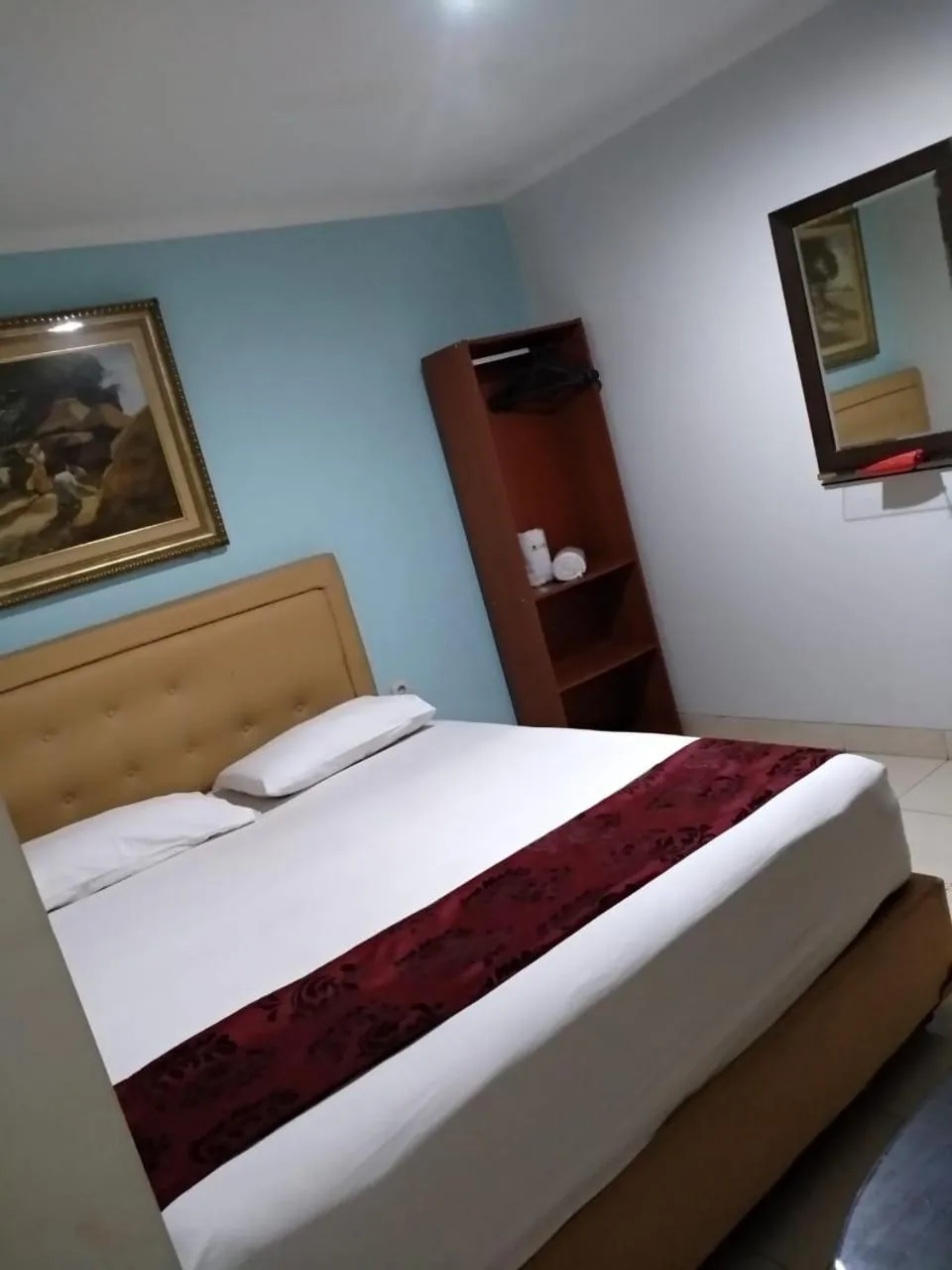 Bed in BLESSING RESIDENCE HOTEL