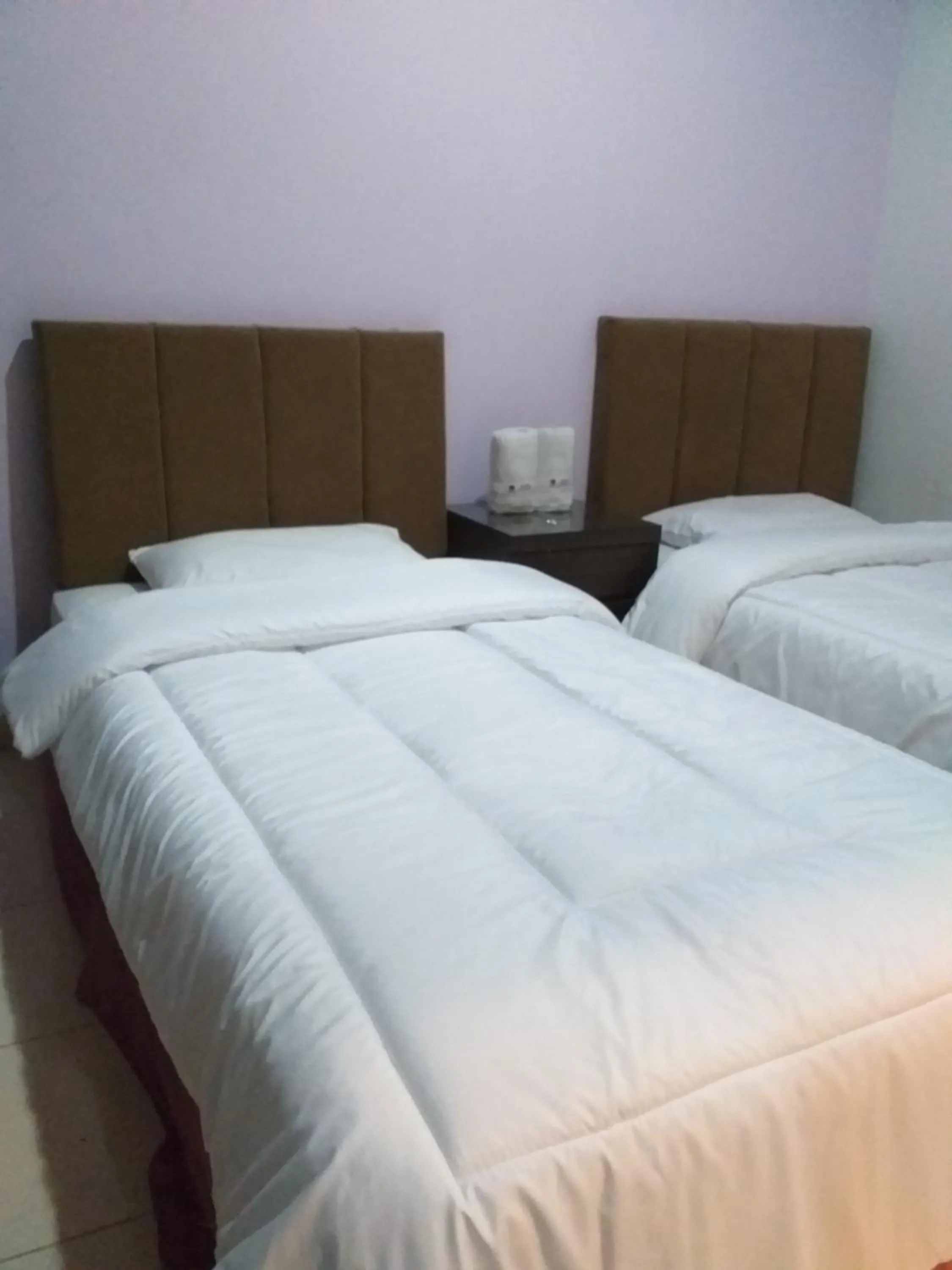 Bed in BLESSING RESIDENCE HOTEL