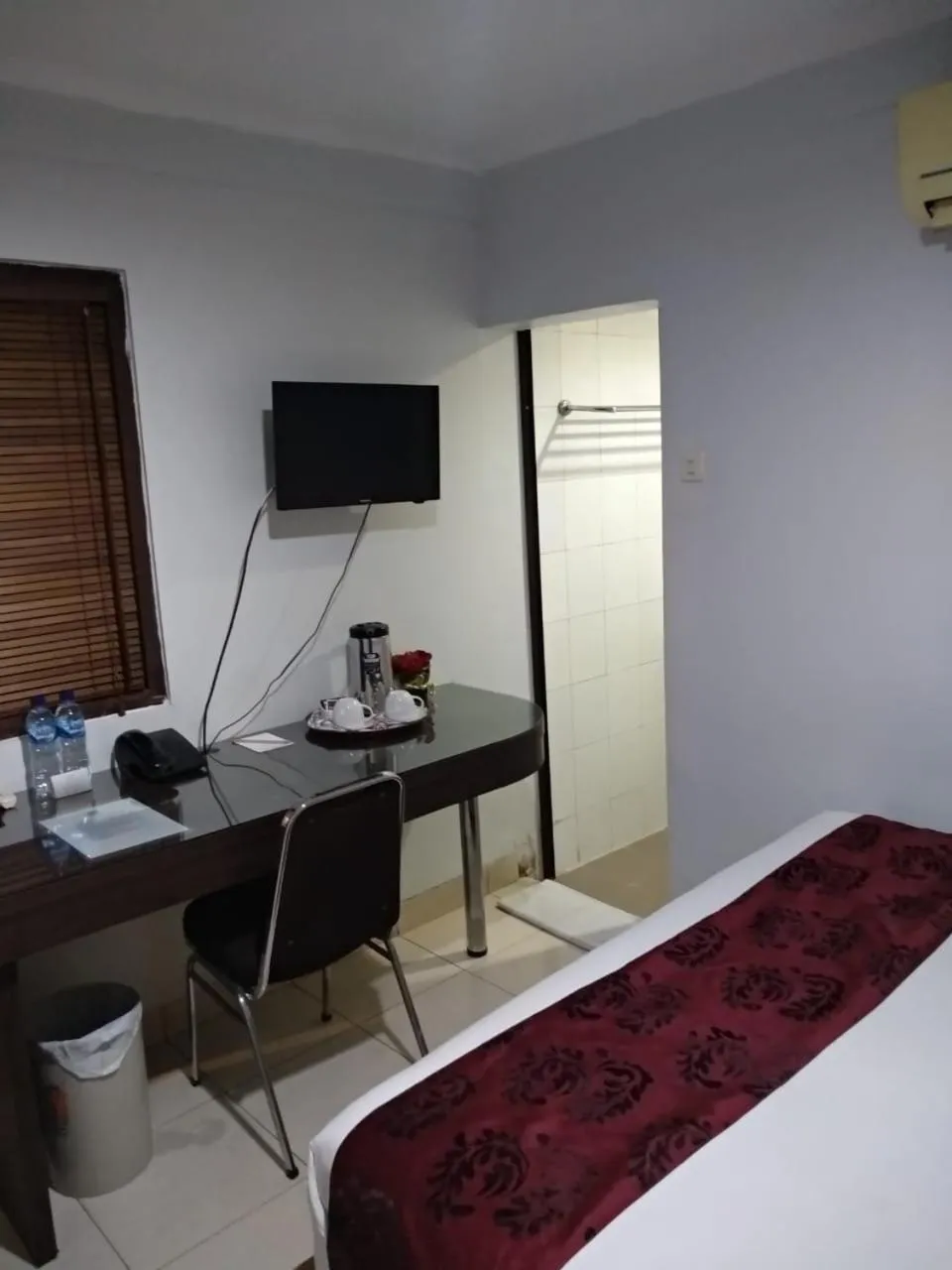 Bed in BLESSING RESIDENCE HOTEL