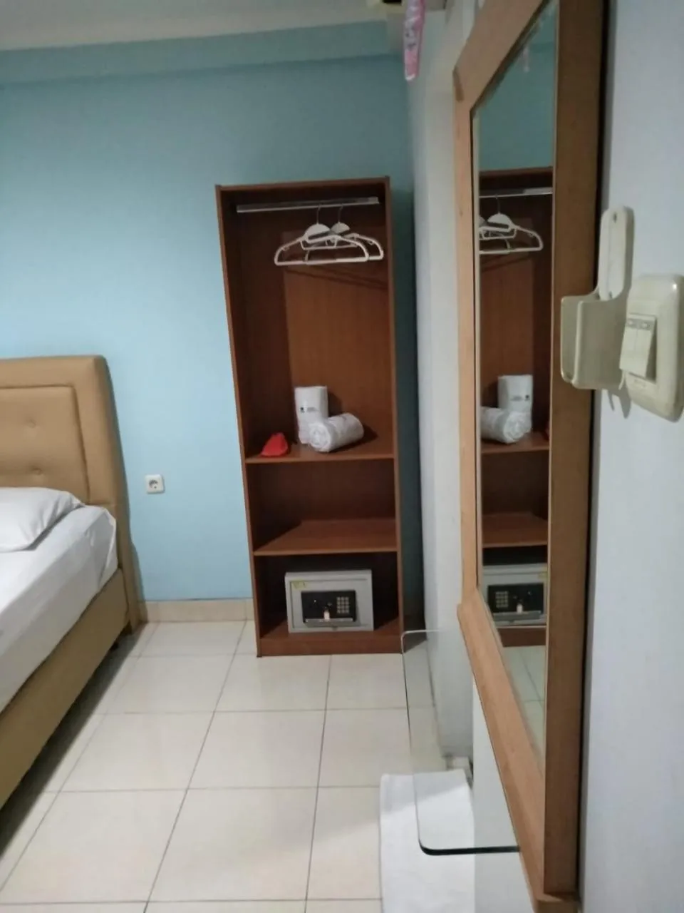 Bed in BLESSING RESIDENCE HOTEL