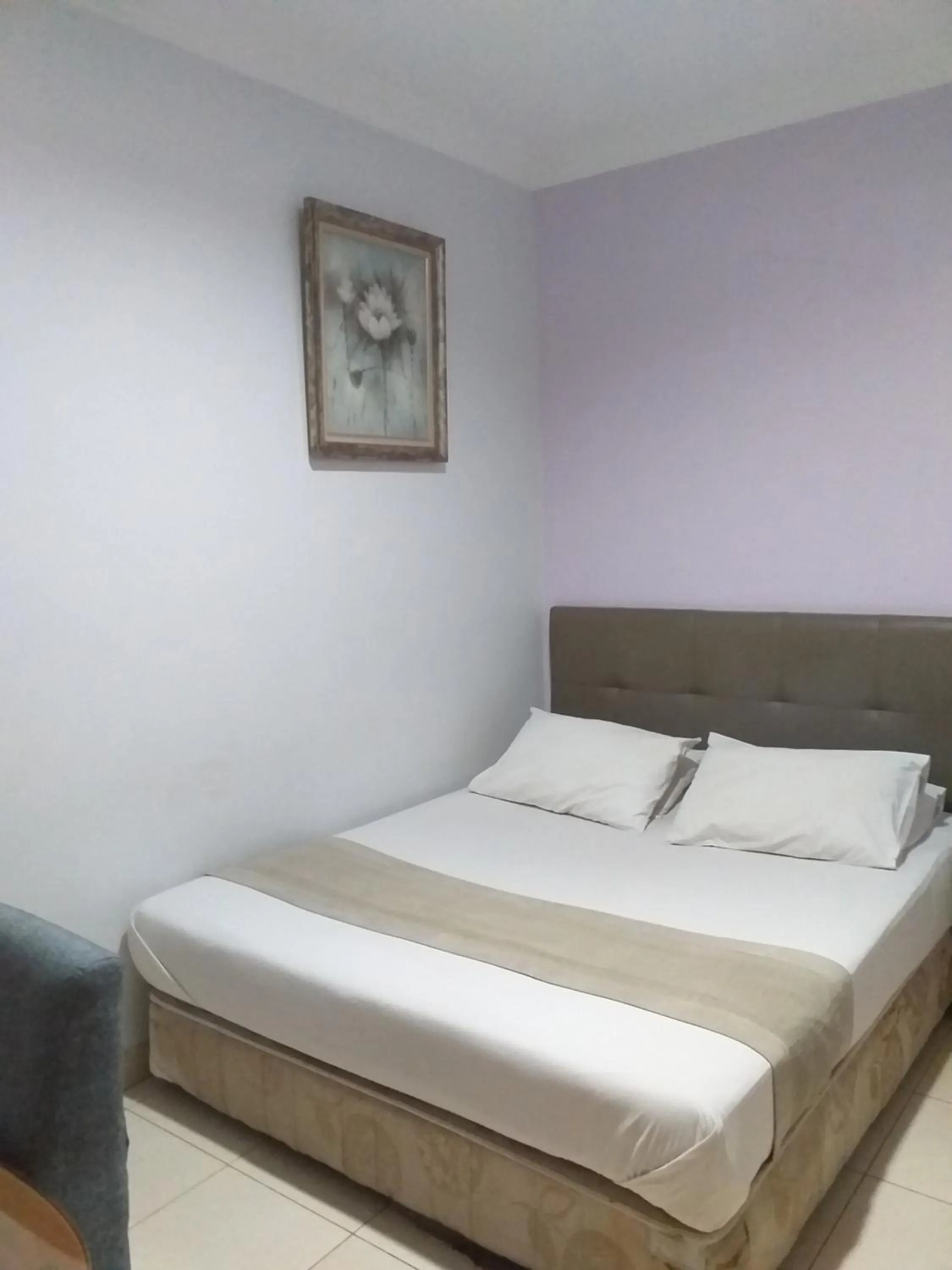 Bed in BLESSING RESIDENCE HOTEL