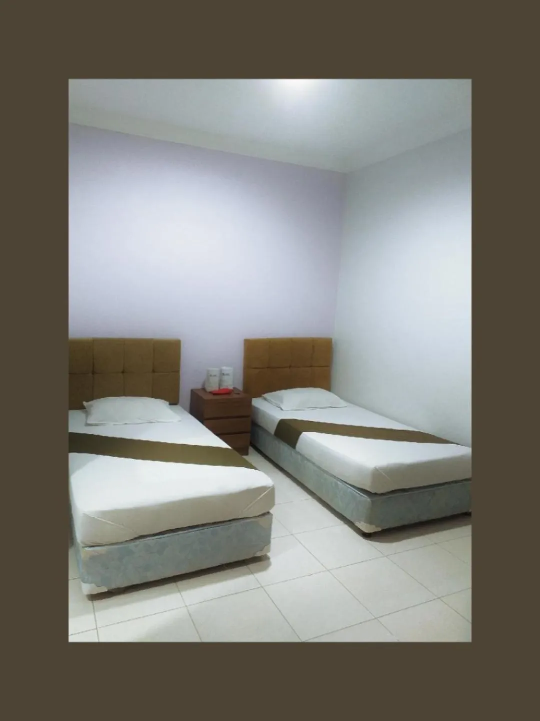 Bed in BLESSING RESIDENCE HOTEL