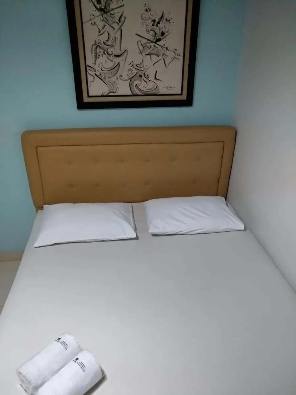 Bed in BLESSING RESIDENCE HOTEL