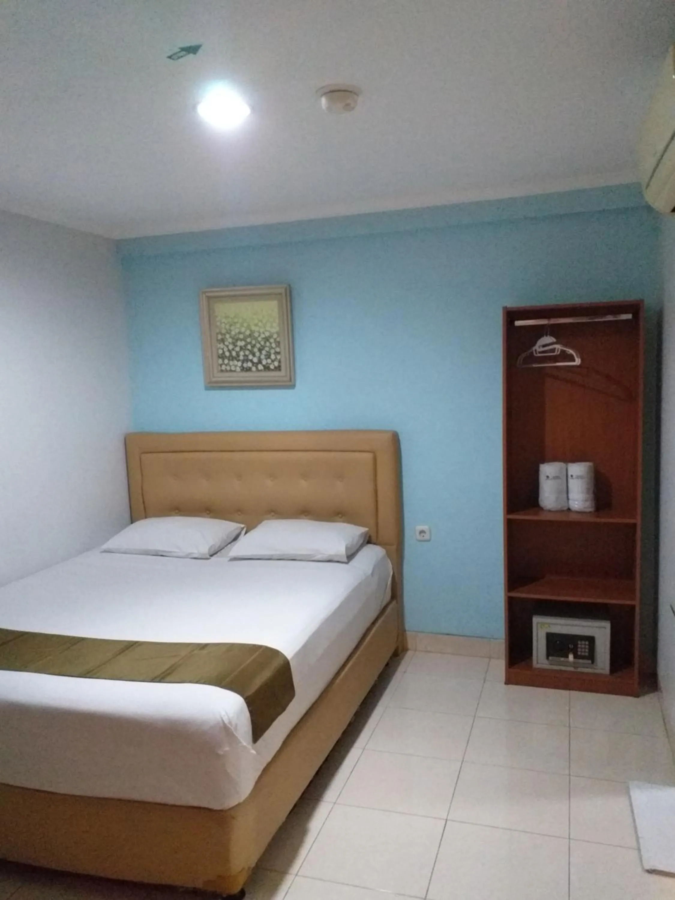 Bed in BLESSING RESIDENCE HOTEL