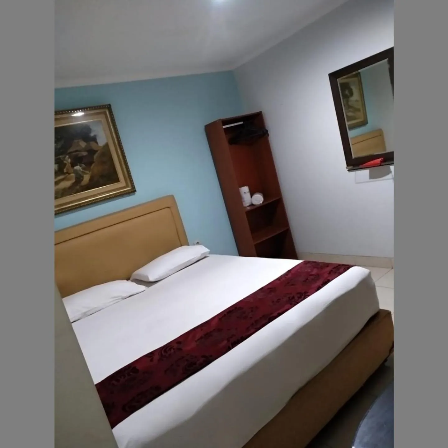 Bed in BLESSING RESIDENCE HOTEL