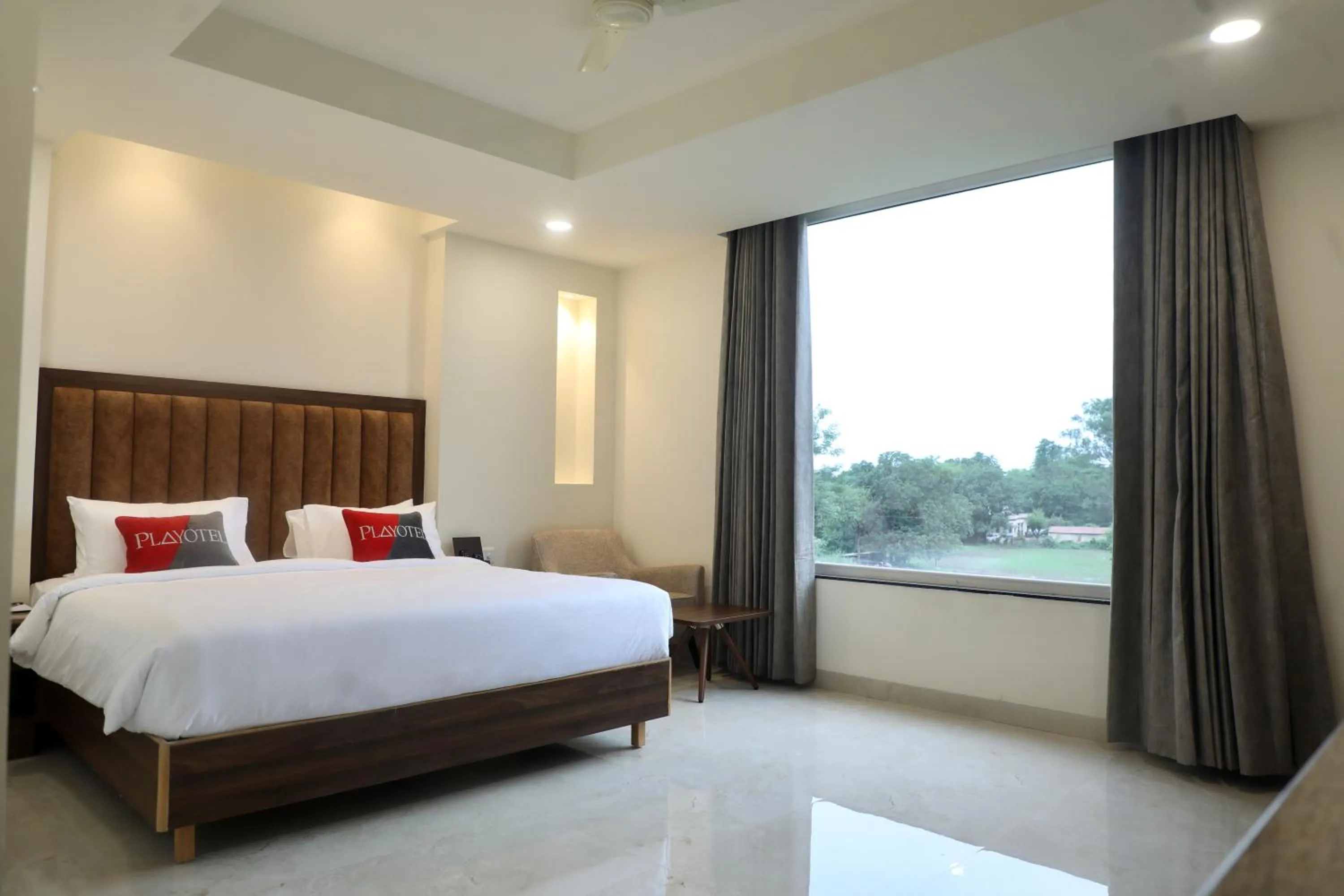 Bed in Playotel Premier Guna