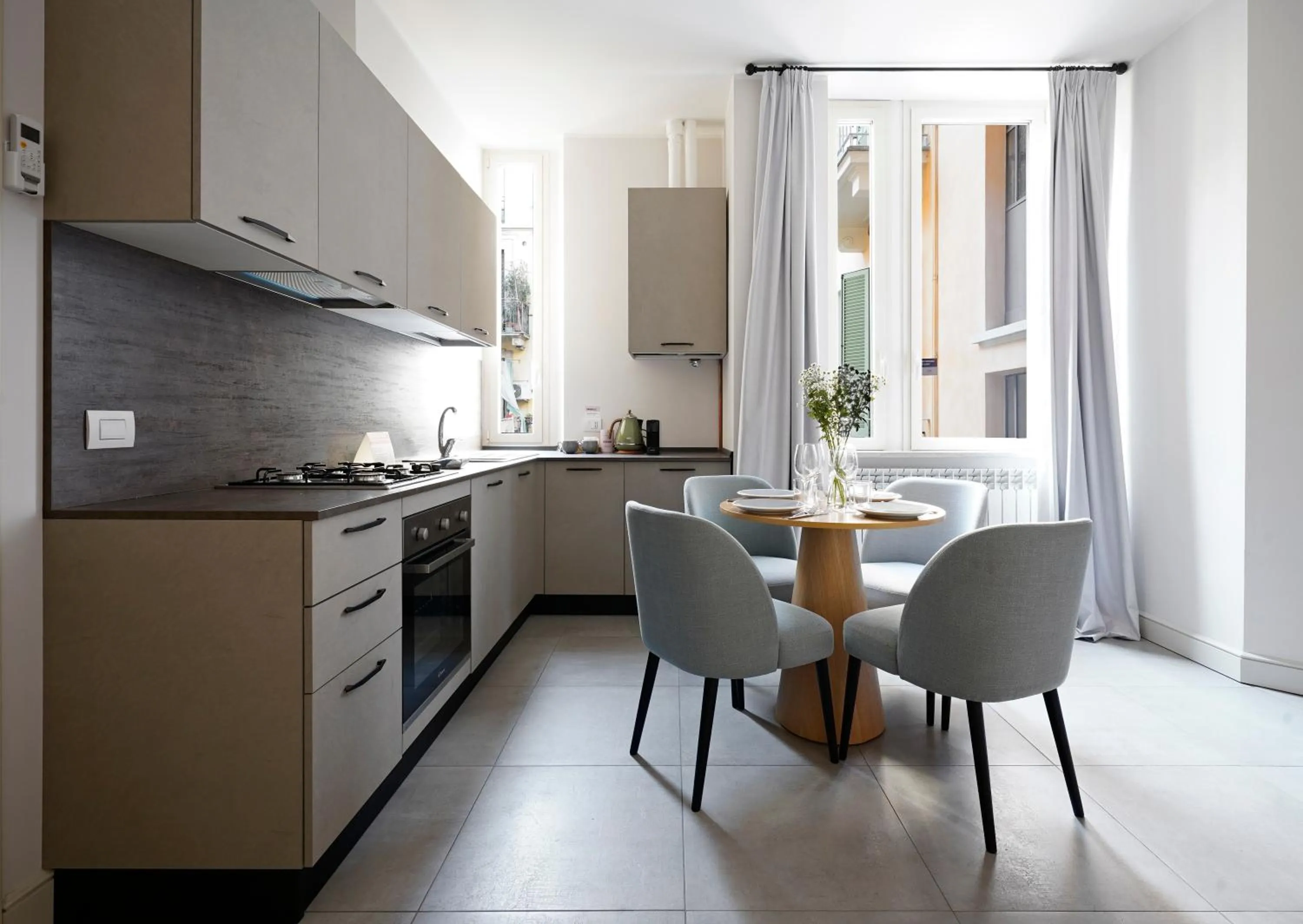 Kitchen or kitchenette in Numa Milan Loreto