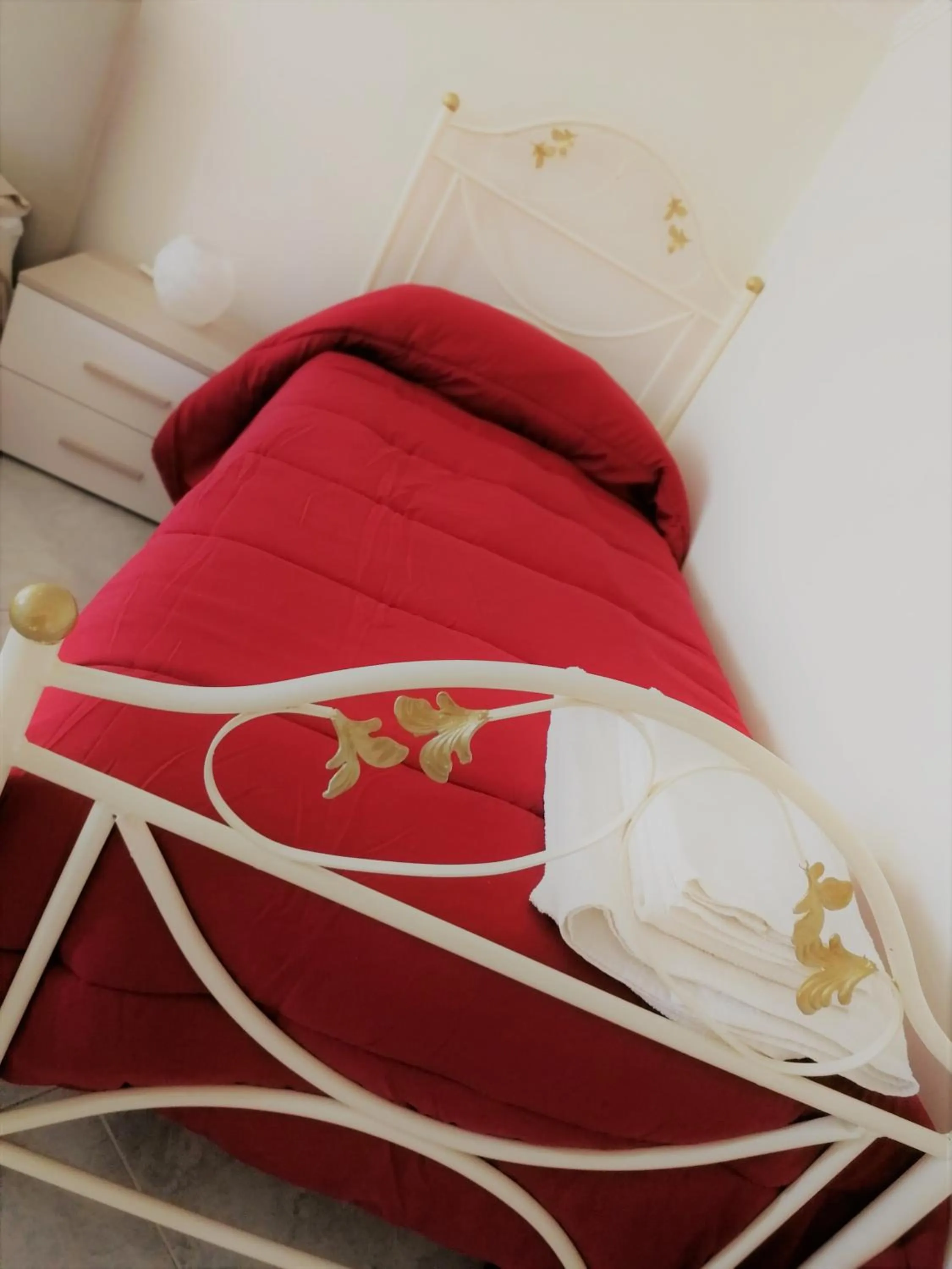 Bed in Rara Domus B&B