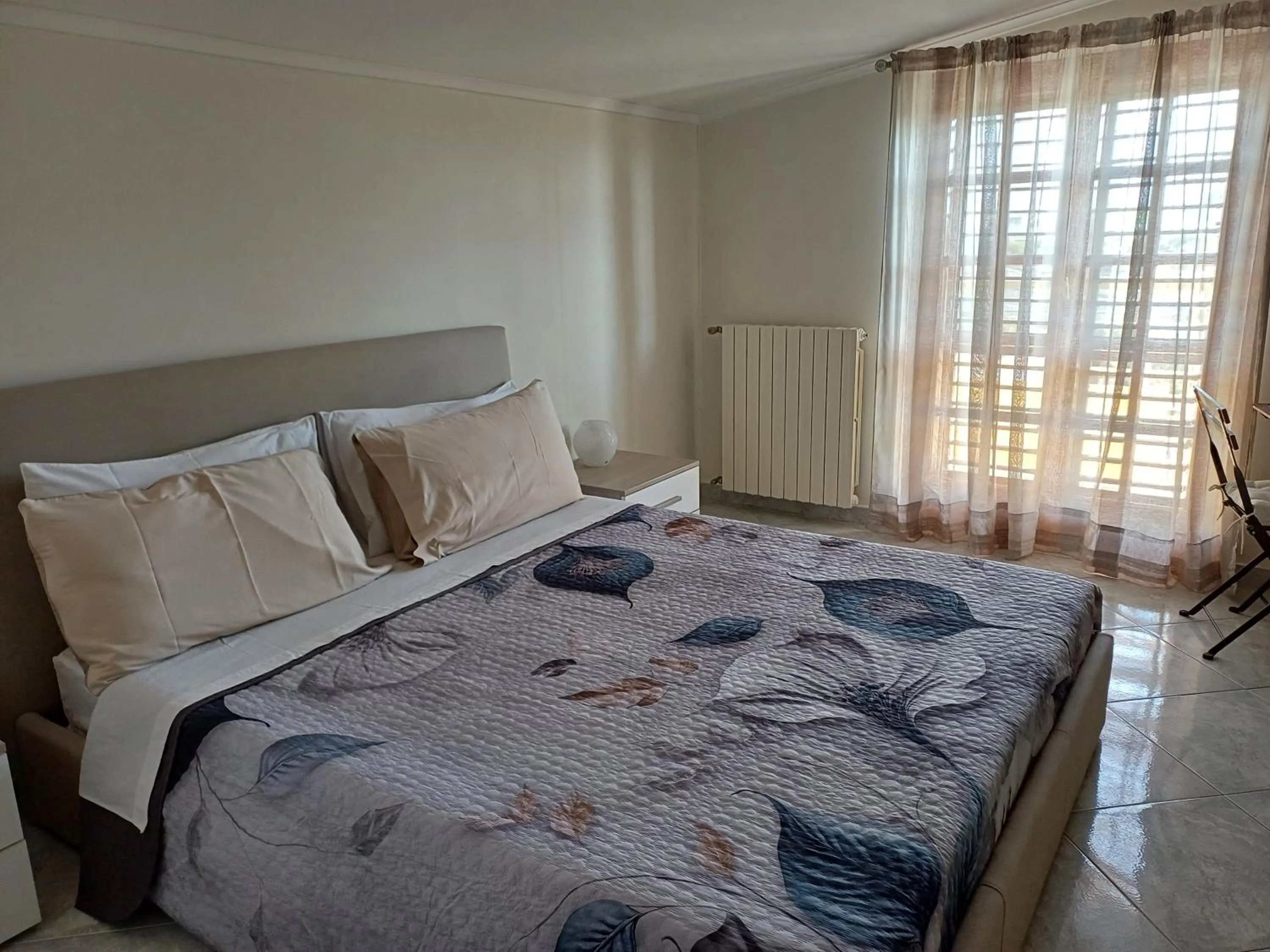 Bed in Rara Domus B&B