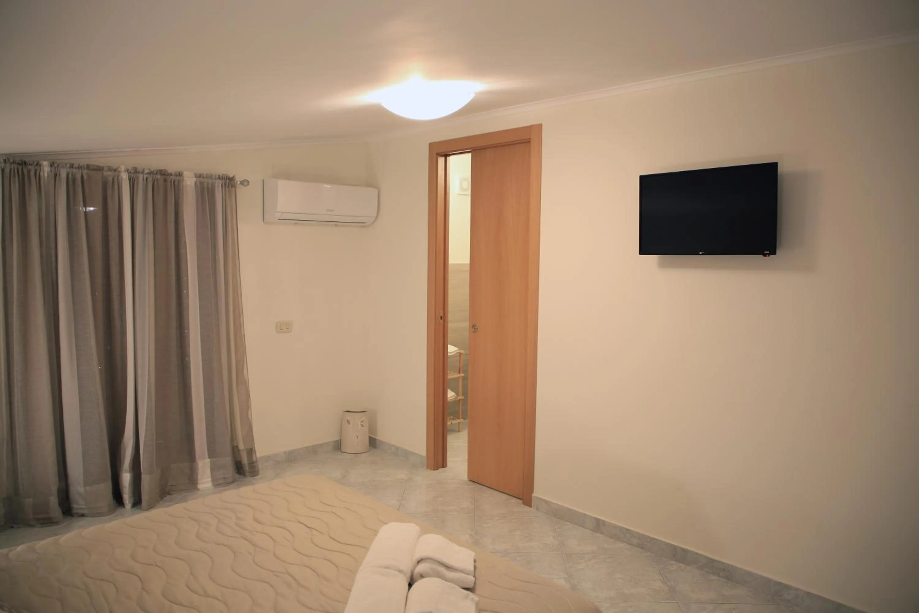 TV and multimedia, Bed in Rara Domus B&B