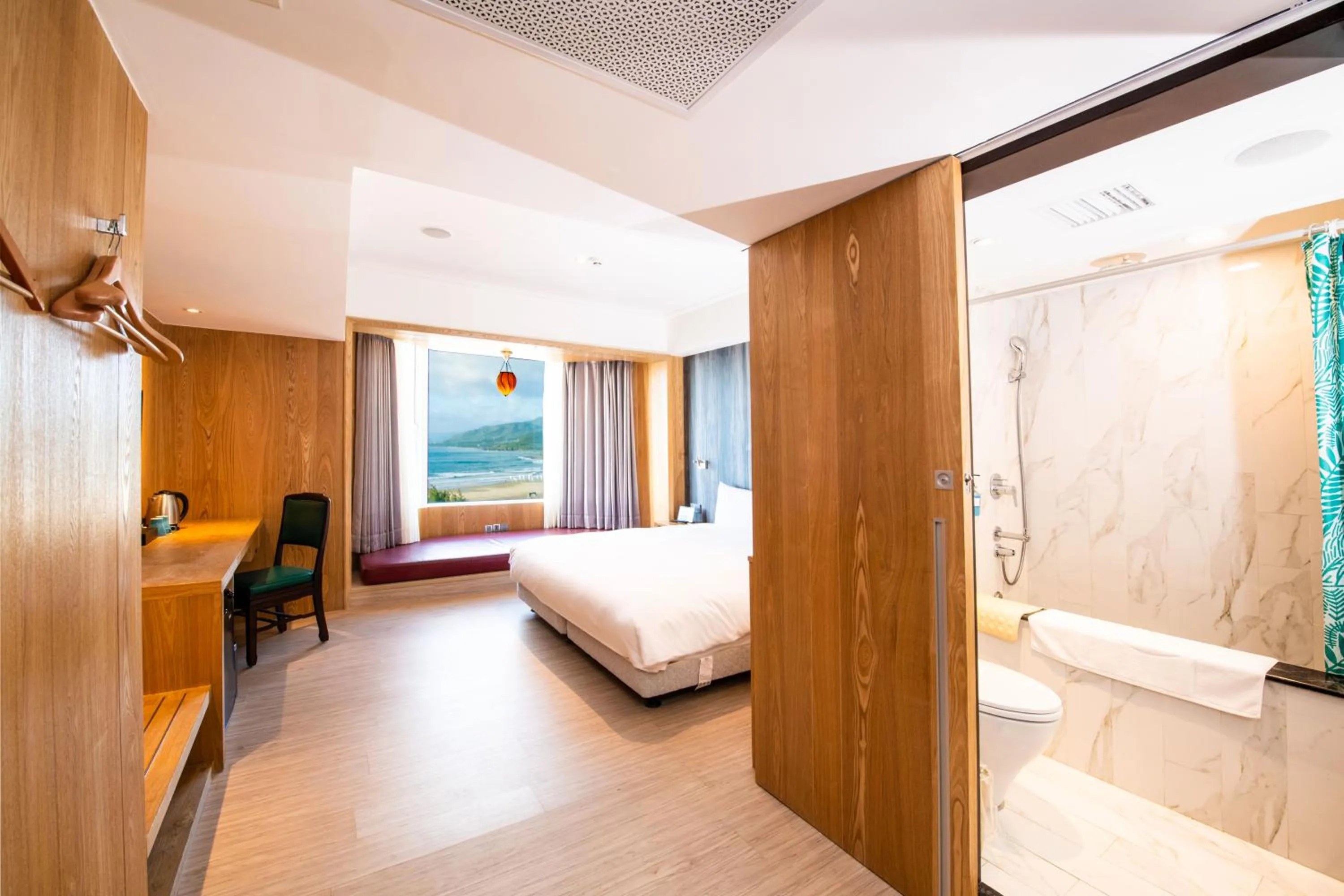 Bed in Kenting Long Beach Hotel