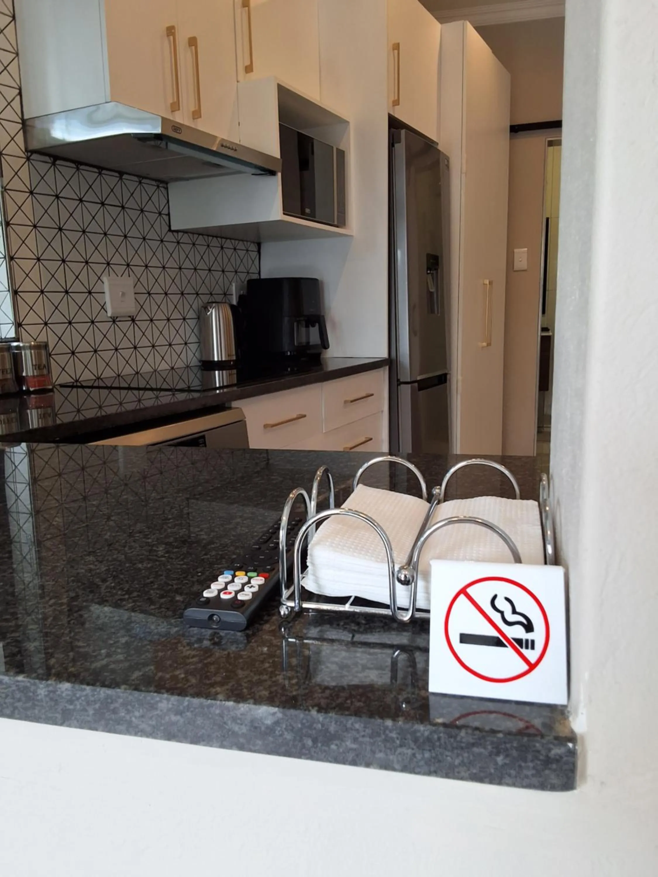 Kitchen or kitchenette in CityView, a stunning modern apartment