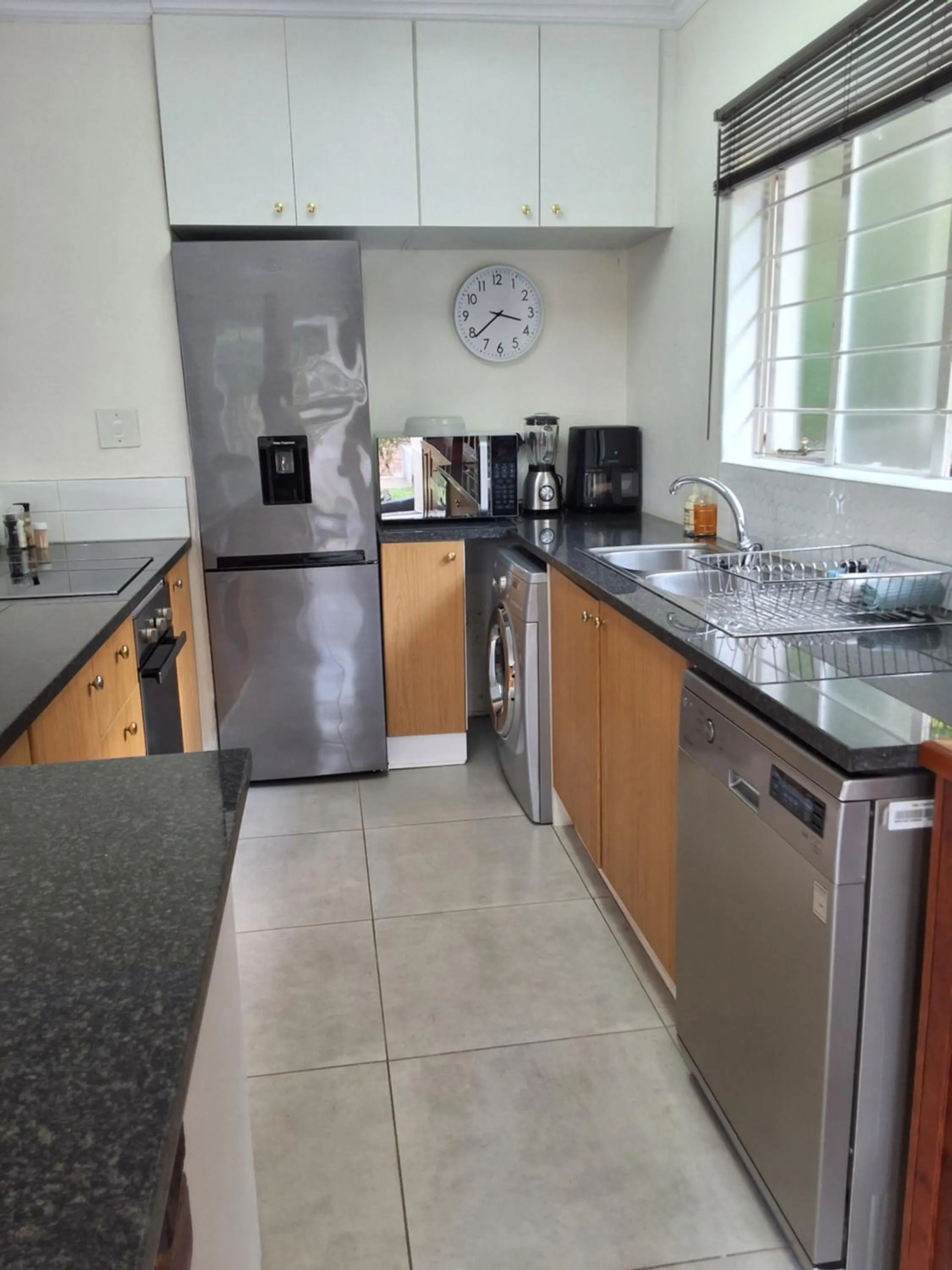 Kitchen or kitchenette in CityView, a stunning modern apartment