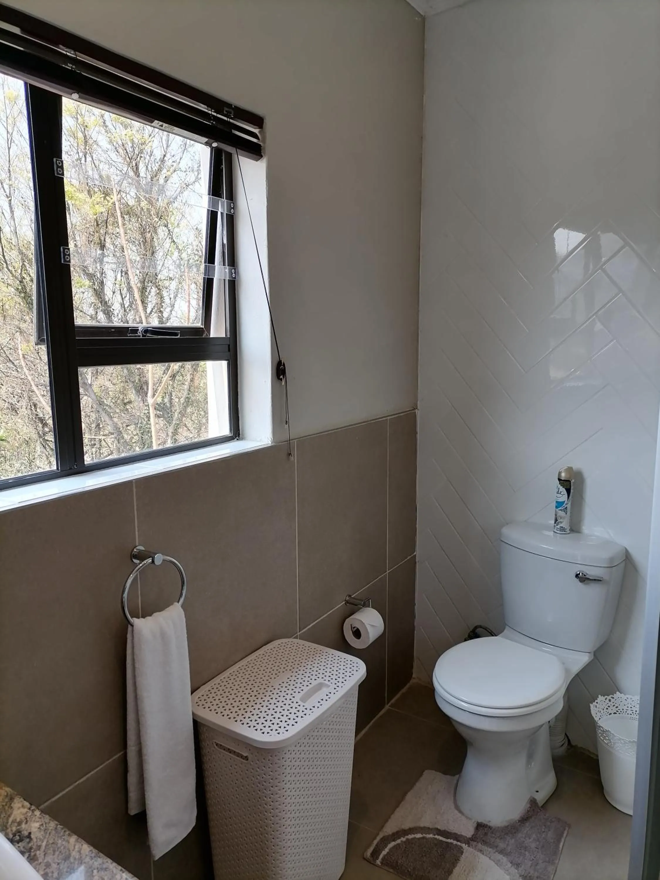 Bathroom in CityView, a stunning modern apartment