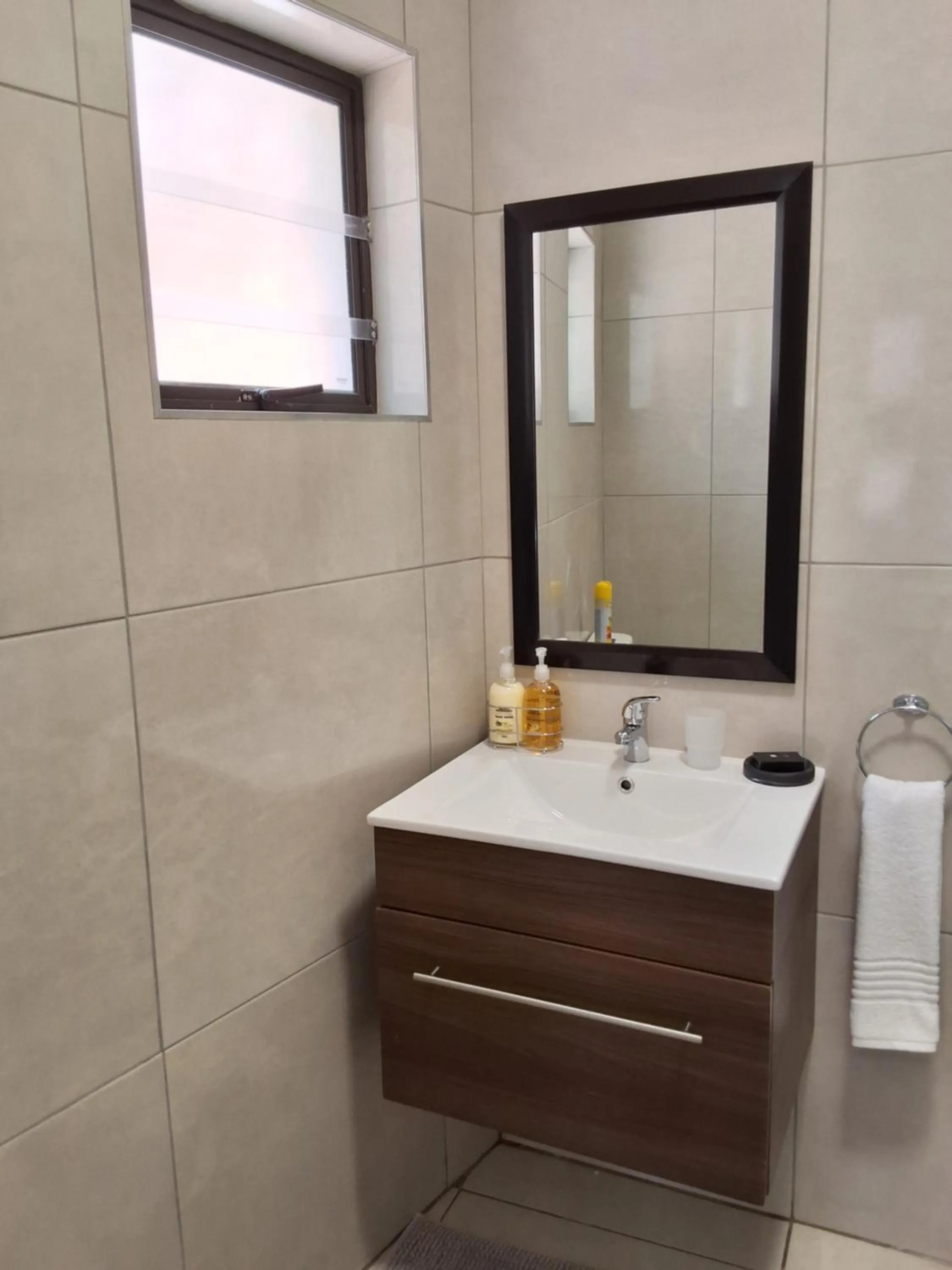 Bathroom in CityView, a stunning modern apartment