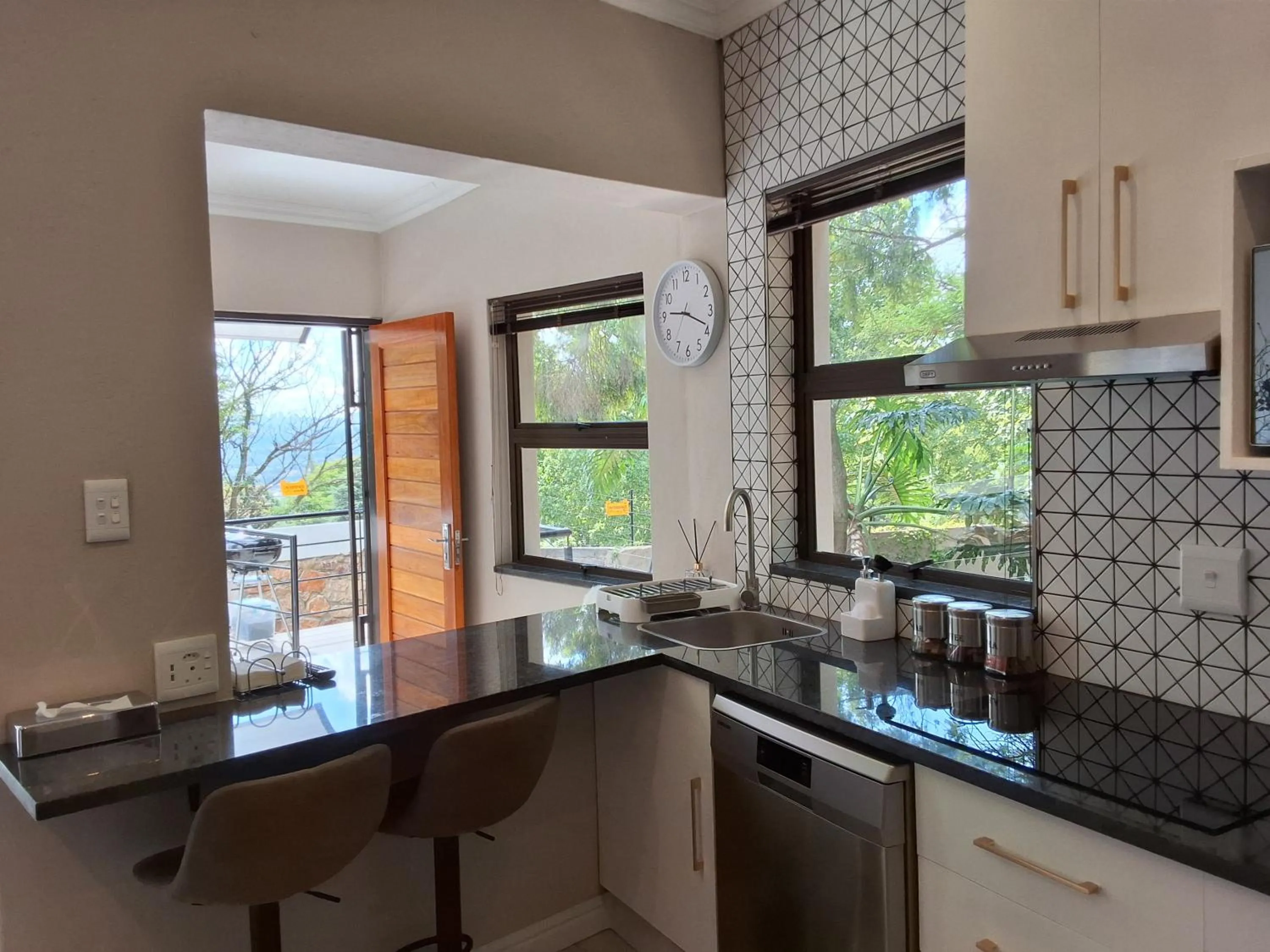 Kitchen or kitchenette in CityView, a stunning modern apartment