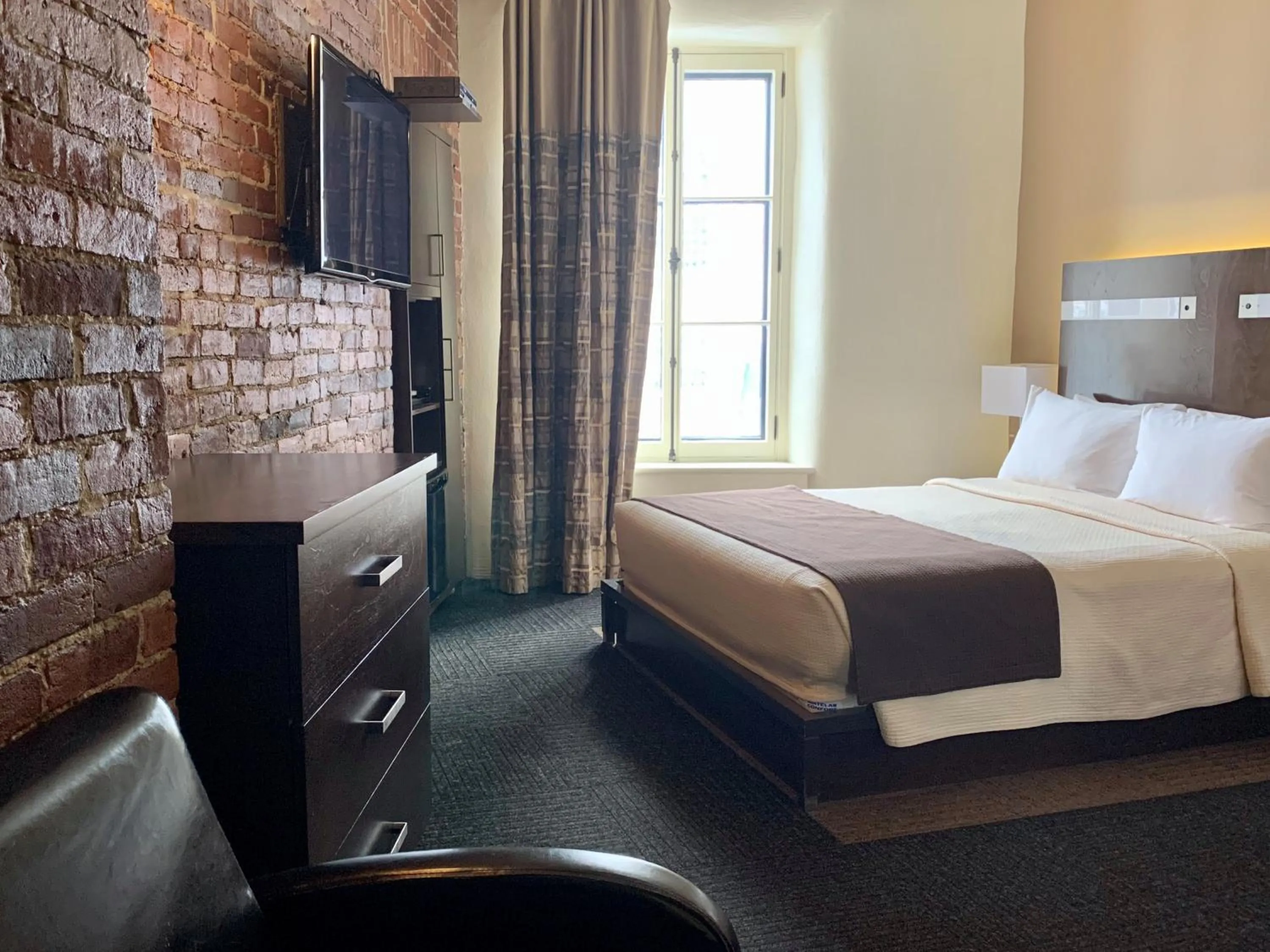 Bed in Hôtel Sainte-Anne