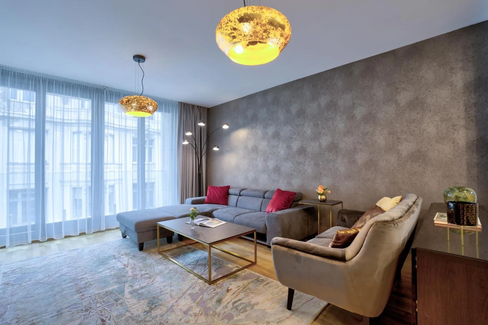 Living room in Emerald Downtown Luxury Suites by Continental Group