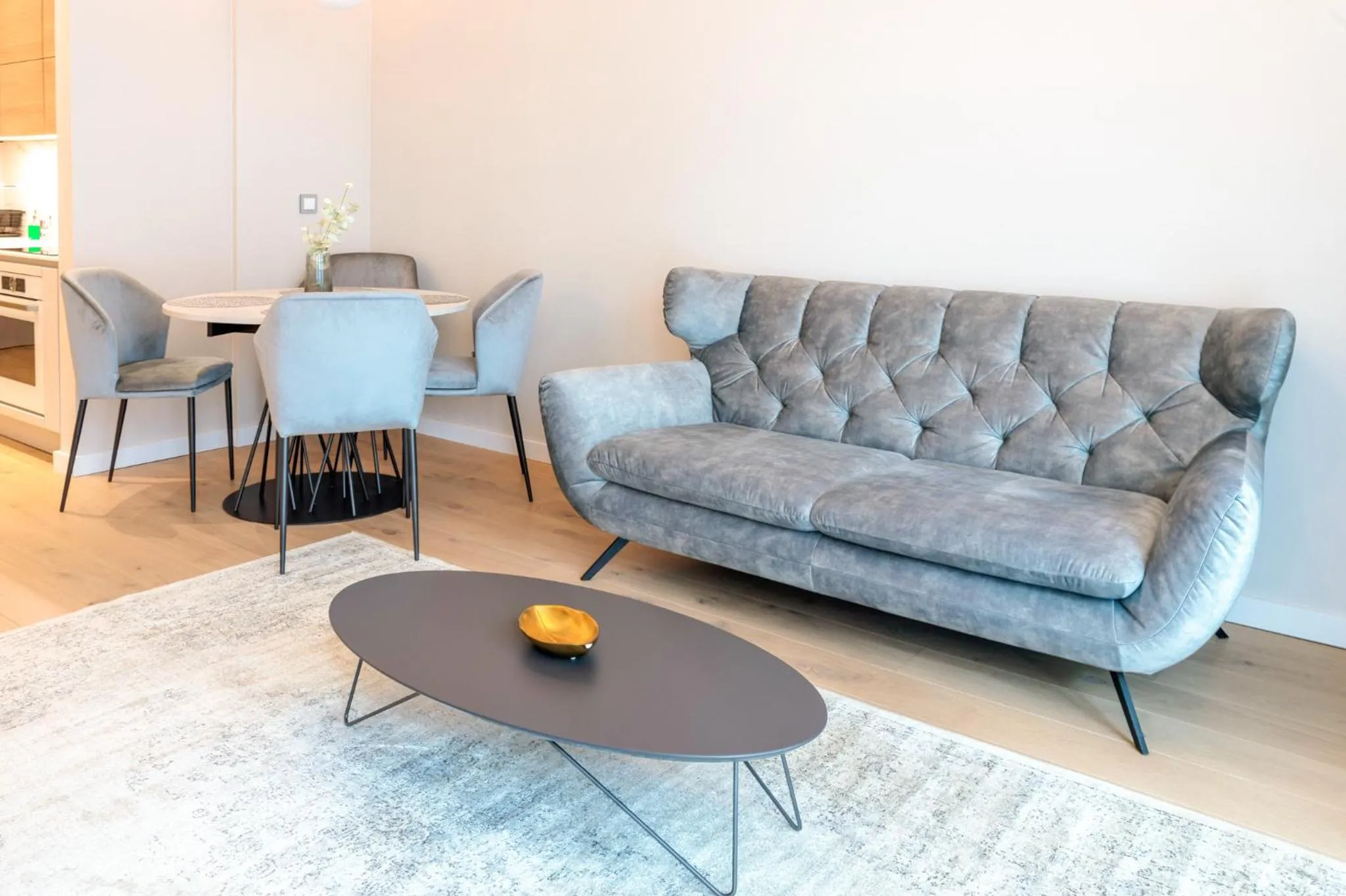 Living room in Emerald Downtown Luxury Suites by Continental Group