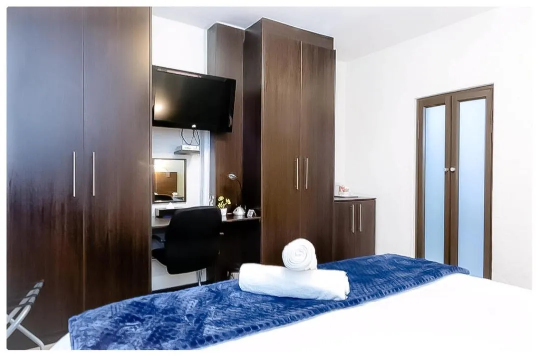 Bed in Beachwood Inn Melkbosstrand