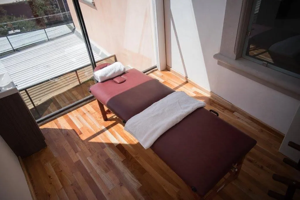 Bed in Posada de Maria Hotel Boutique & Spa